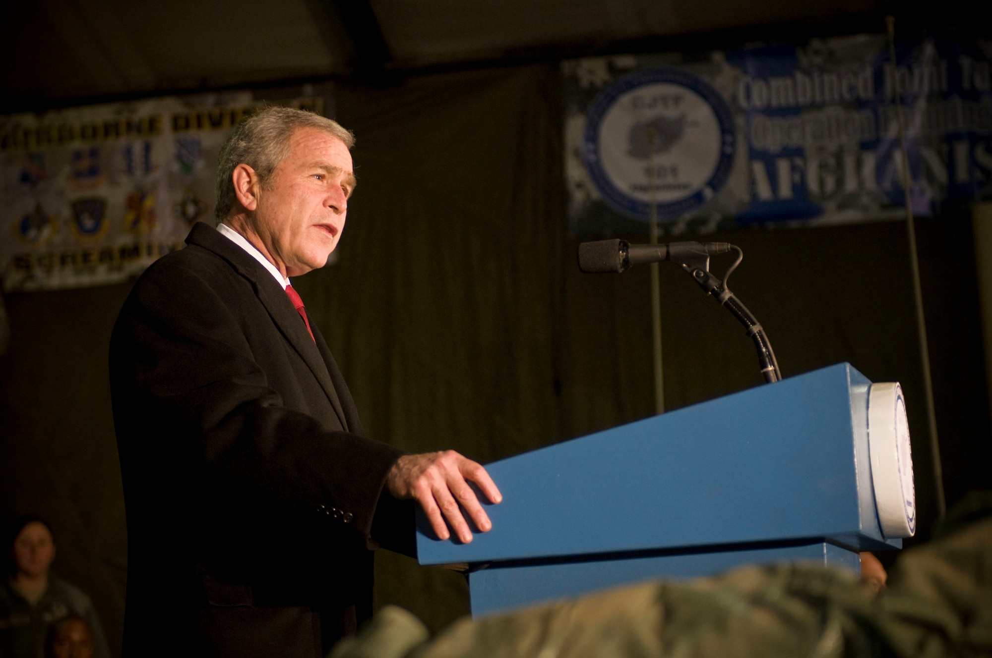 President George W. Bush gives a speech to a crowd of military personnel and civilians gathered at Bagram Air Field, Afghanistan, Dec. 15. On his last tour through Afghanistan, President Bush thanked all the deployed troops for their hard work and dedication. (U.S. Air Force photo by Staff Sgt. Samuel Morse)(Released)