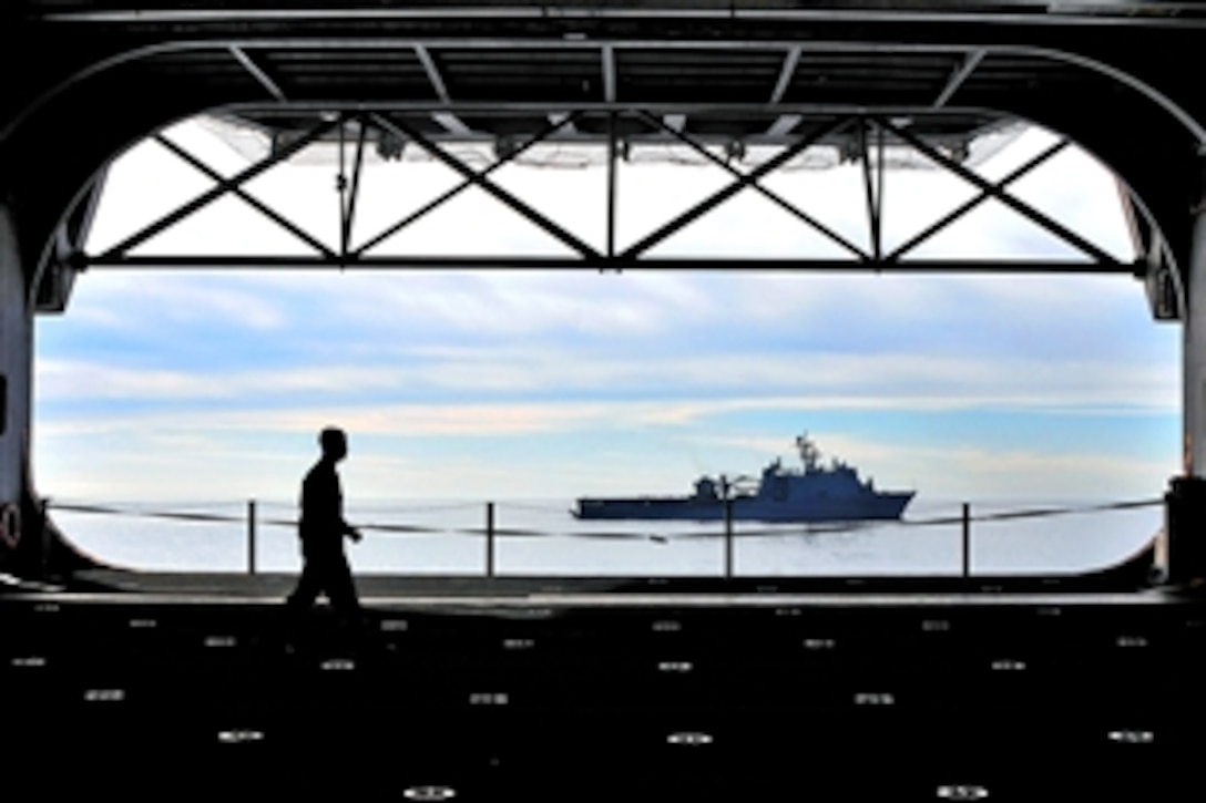 The amphibious dock landing ship USS Comstock participates in a vertical replenishment with the amphibious assault ship USS Boxer off the coast of southern California in the Pacific Ocean, Dec. 11, 2008. The USS Comstock is part of the Boxer Expeditionary Strike Group certification exercise to prepare for an upcoming deployment.