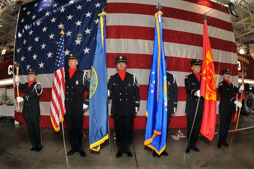 OFFUTT AIR FORCE BASE, Neb.,- Offutt's Firefighter Ceremonial Guard lines up to post the colors in celebration of Fire Chief Robin Gullie's retirement ceremony Dec. 12.  (Photo By: Charles Haymond).  