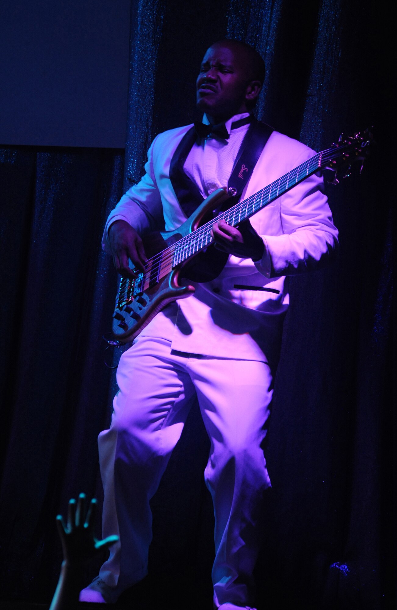 ELMENDORF AIR FORCE BASE, Alaska -- Airman 1st Class Henry Roberson performs for the audience the "Deja Blue" performance at the base theater Dec. 14. Airman Roberson is an Intelligence Analyst from Hickam, Hawaii. (U.S. Air Force photo/Senior Airman Matthew Owens)