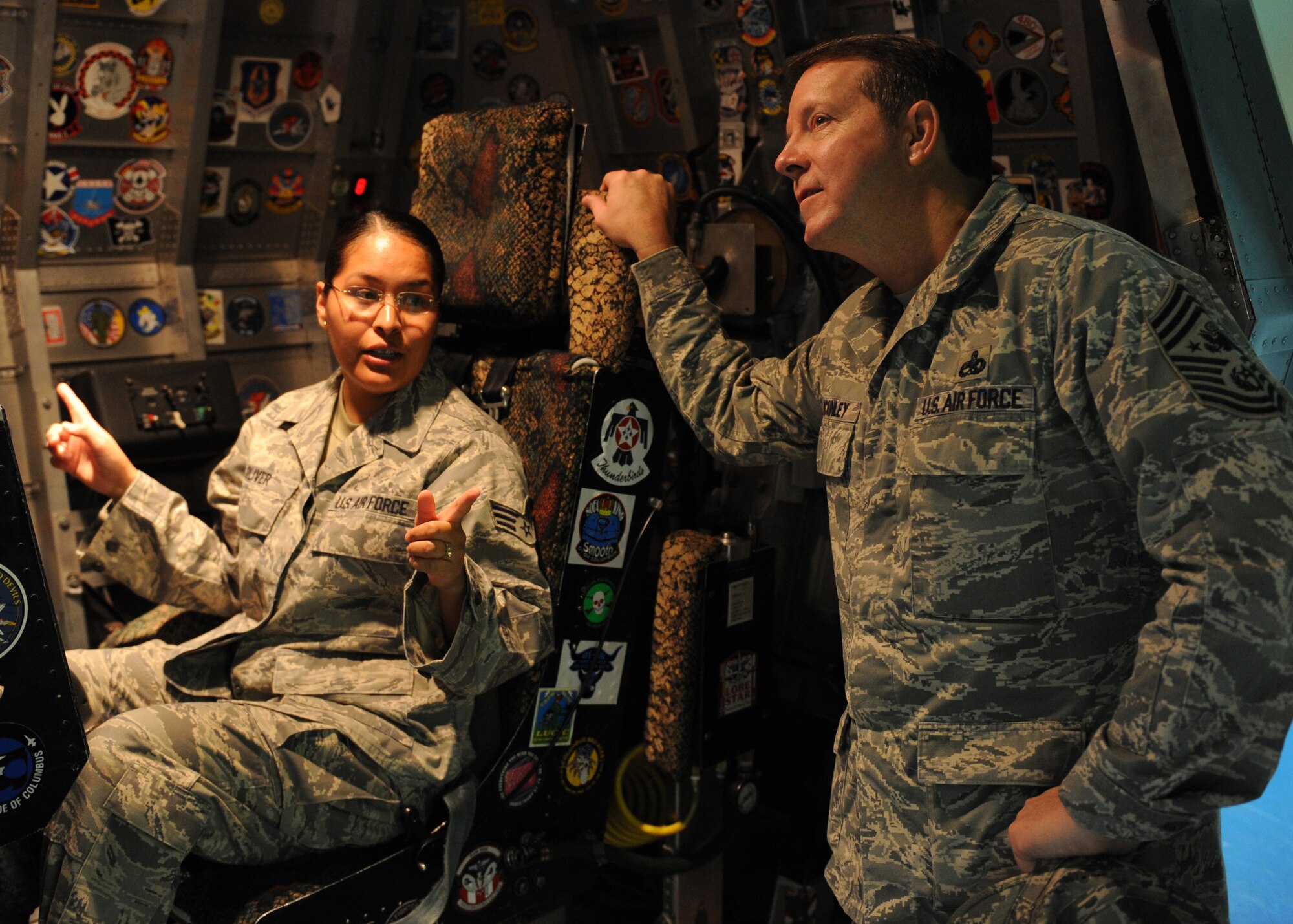 Senior Airman Janet Oliver, 49th Medical Group, gives Chief Master Sgt. of the Air Force Rodney J. McKinley a tour of the Physiological Training Center at Holloman Air Force Base, N.M., Dec. 9. Chief McKinley toured all three New Mexico bases to familiarize himself with the people and missions of Holloman, Kirtland and Cannon AFB. (U.S. Air Force photo/Airman 1st Class Michael Means)