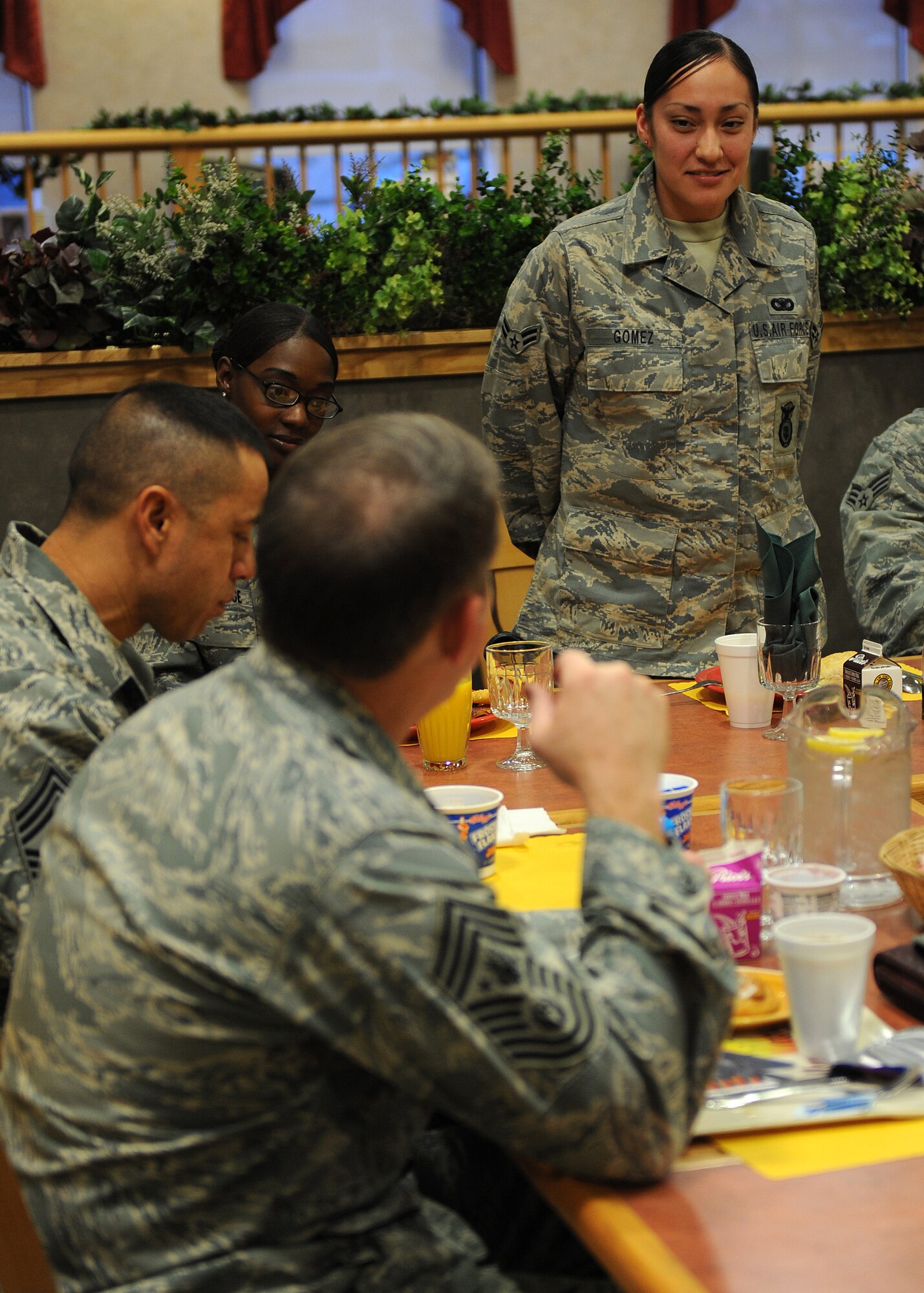 Airman 1st Class Lorena Gomez, 49th Security Forces Squadron, speaks to Chief Master Sgt. of the Air Force Rodney J. McKinley at Holloman Air Force Base, N.M., Dec. 9. Chief McKinley toured all three New Mexico bases to familiarize himself with the people and missions of Holloman, Kirtland and Cannon AFB. (U.S. Air Force photo/Airman 1st Class Michael Means)