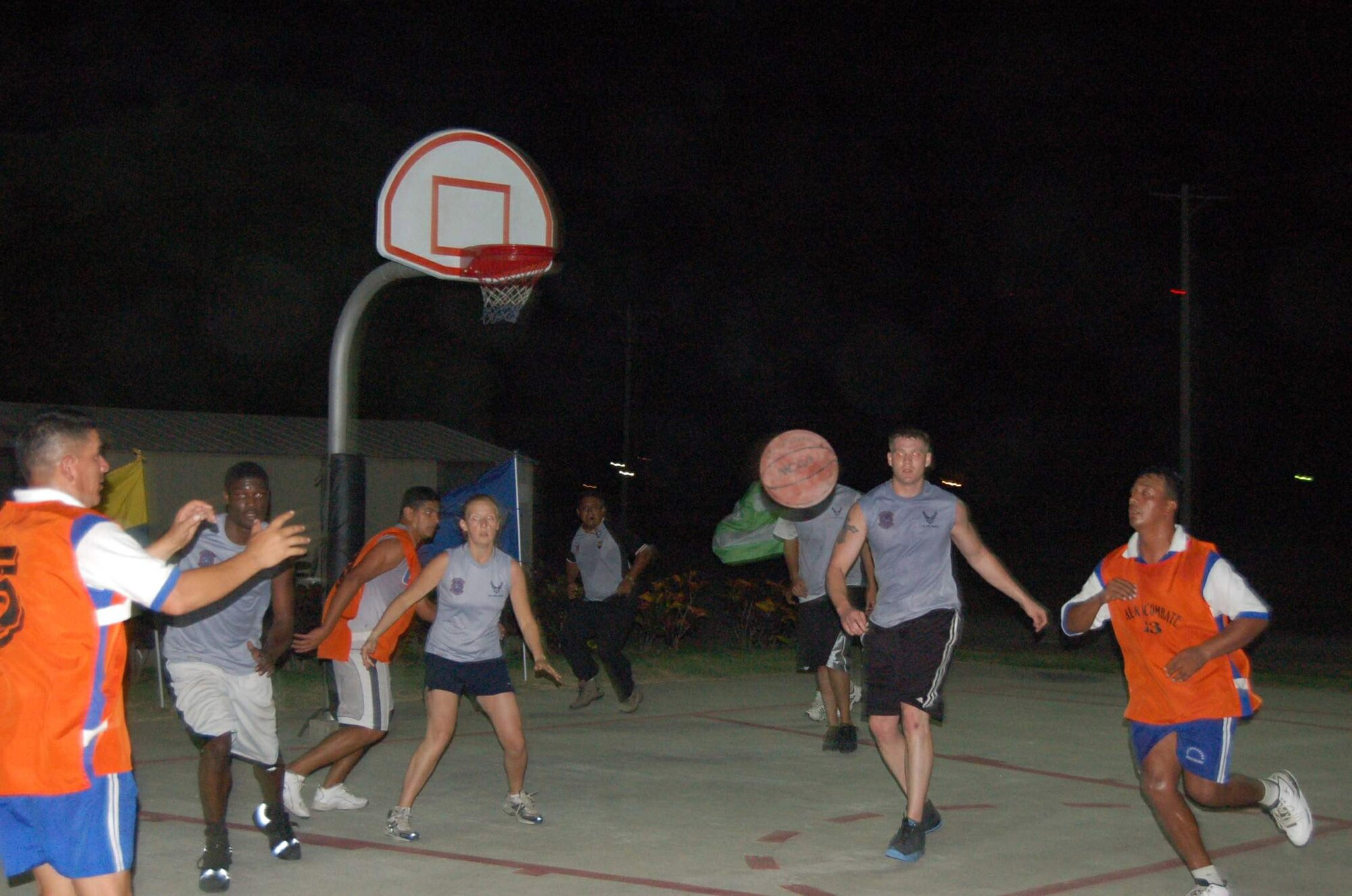 The Ecuadorian air force team squares off against the U.S. Air Force basketball team during a championship basketball game Dec. 9 at Forward Operating Location Manta in Ecuador. Nearly 100 fans cheered on their favorite team, as the Ecuadorian air force pulled out a 26-25 victory. (U.S. Air Force photo/Tech. Sgt. Matthew McGovern) 
