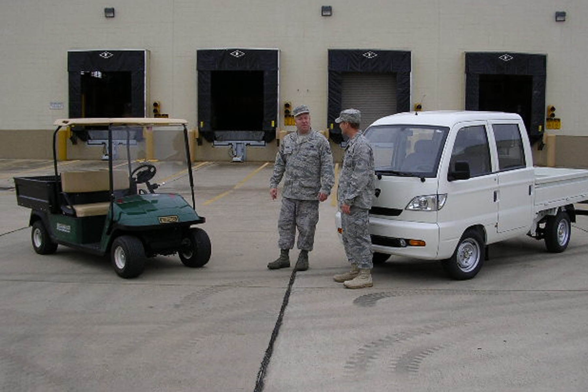 1st Lt Tim Breitbach, 96th Logistics Readiness Squadron's Flight Commander, Vehicle Management, explains the differences between a low-speed vehicles  and other governmental motor vehicle conveyances to Tech Sgt. David Yeadon. (USAF photo)