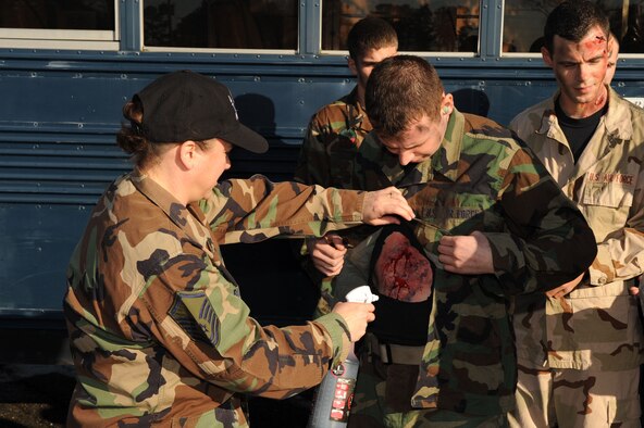 Moulage is applied to Airmen who participated as victims in a scenario for the statewide exercise Orbit Comet during the week of Dec. 8 - 12, here at Seymour Johnson Air Force Base, N.C.  Orbit comet is an exercise held annually to test the responsiveness and inter-agency cooperation between local authorities and Seymour Johnson Air Force Base emergency responders. (U.S. Air Force photo by Airman 1st Class Ciara Wymbs)