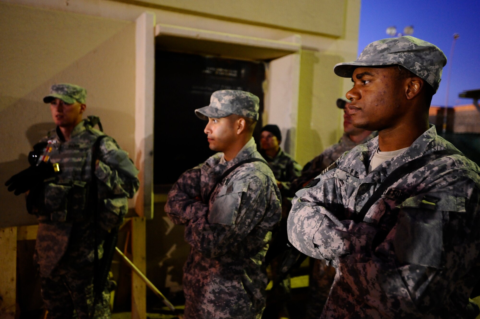 Air Force Staff Sgt. Kevin Tyee (right) listens to a briefing at Joint Base Balad, Iraq, before an outside-the-wire mission Dec. 11. Tyee and other Airmen from the 732nd Expeditionary Civil Engineer Squadron Detachment 6 undertake construction projects for the Army. Tyee, a 732nd ECES Det. 6 electrical systems specialist and native of Oklahoma City, is deployed from Yokota Air Base, Japan. (U.S. Air Force photo/Airman 1st Class Jason Epley)