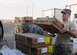 SOUTHWEST ASIA -- Staff Sgt. Ryan Gunderson from the 380th Expeditionary Force Support Squadron helps stock frozen foods here. Sergeant Gunderson works with other members of EFSS three times a week to offload trucks and stock different frozen and dry storage food items. Sergeant Gunderson also inspects all the rations and keeps an inventory to ensure that the food supply does not run out. Sergeant Gunderson is deployed from the 148th FSS, Hill Air Force Base, Utah, his hometown is Eatonville, Wash. (U.S. Air Force photo/Tech. Sgt. Christopher A. Campbell)(released)