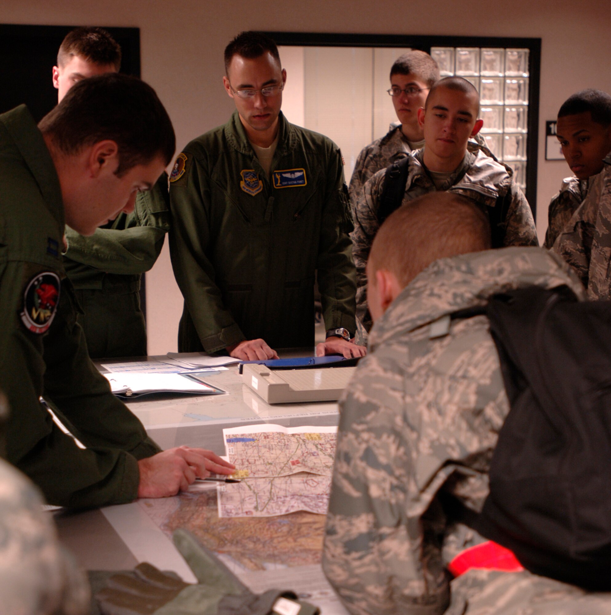 MCCONNELL AIR FORCE BASE, Kan. -- Airmen receive a pre-mission brief before a 
KC-135 Stratotanker incentive flight in the 349th Air Refueling Squadron, Dec. 11. (Photo by Senior Airman Laura Suttles)
