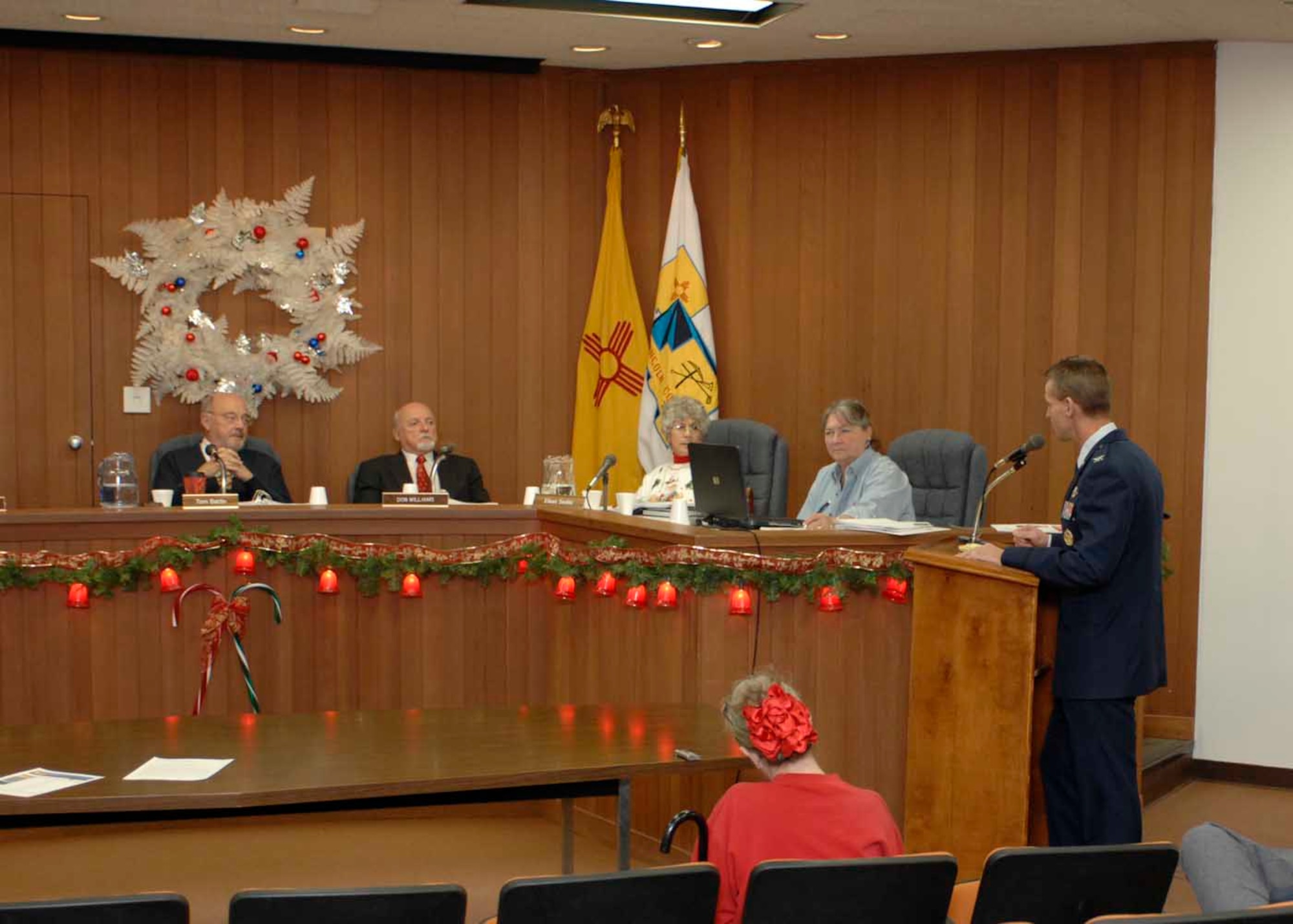 Col. Michael Stapleton, 49th Operations Group commander, talks with members of the Lincoln county commission at the County Commission's Chamber at Carrizozo, N.M. Dec. 16. Colonel Stapleton was there to speak about F-22A Raptor supersonic flight operations. (U.S. Air Force photo/Airman 1st Class Rachel A. Kocin)