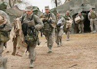 12/15/2008 - Air Force basic military trainees get their gear at the new $28 million Basic Expeditionary Airman Skills Training course at Lackland Air Force Base Dec. 15. At the new BEAST site, trainees will face a series of increasingly difficult exercise events under simulated, realistic, combat conditions, allowing them to practice war skills such as basic self-defense, integrated base defense, self aid and buddy care, and improvised explosive device training. (USAF photo by Robbin Cresswell)  