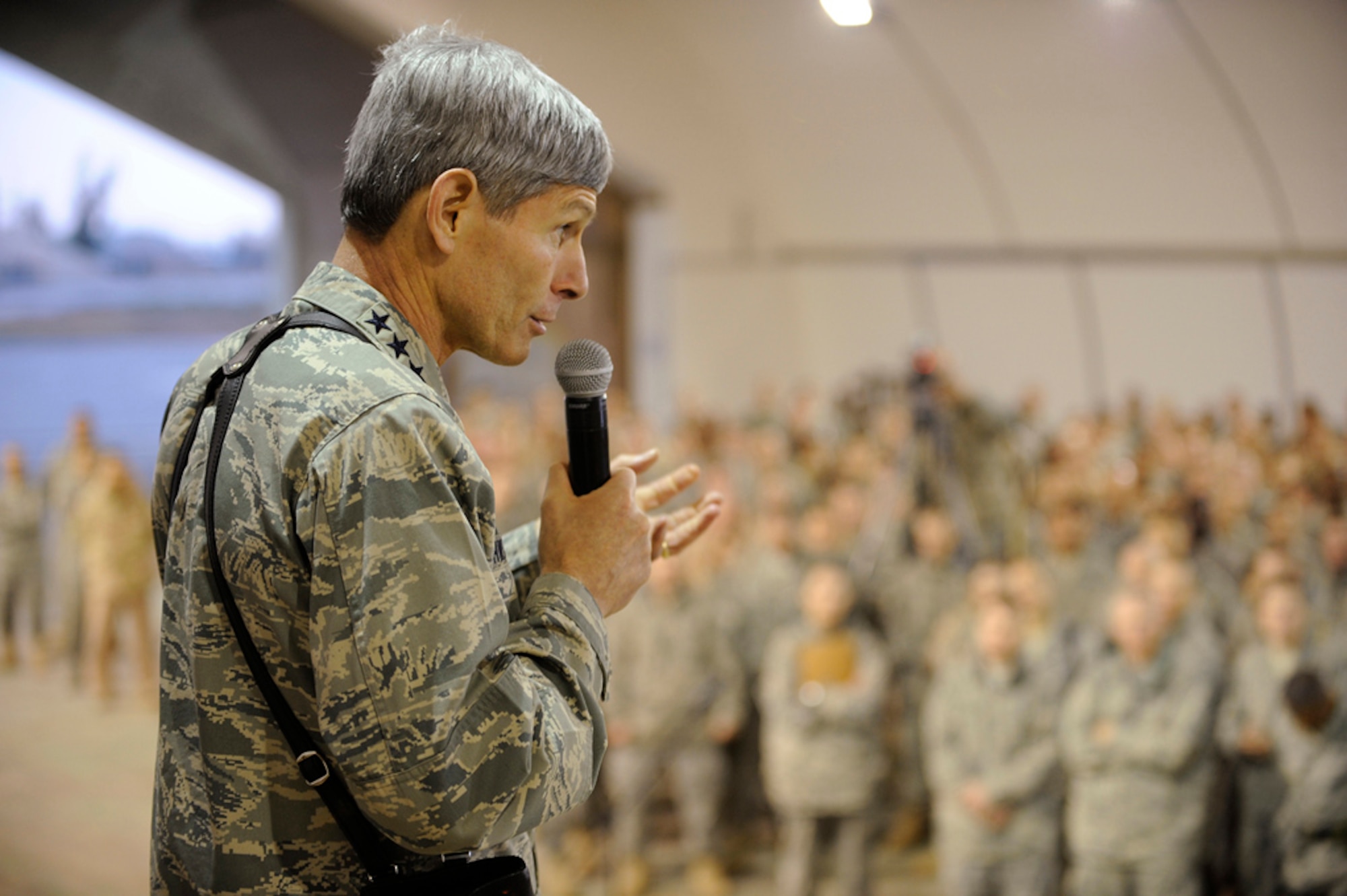 Air Force Chief of Staff Gen. Norton Schwartz speaks at an Airman's Call at Joint Base Balad, Iraq, during a recent tour of Southwest Asia installations.  General Schwartz announced Dec. 17 that an Airman previously categorized as filling an "in lieu of" or ILO tasking now would be referred to as filling a "joint expeditionary tasking," or JET.  He stated that the term JET reinforces the Air Force's commitment to the joint fight as an equal member of the joint team.  (U.S. Air Force photo/Airman 1st Class Jason Epley)