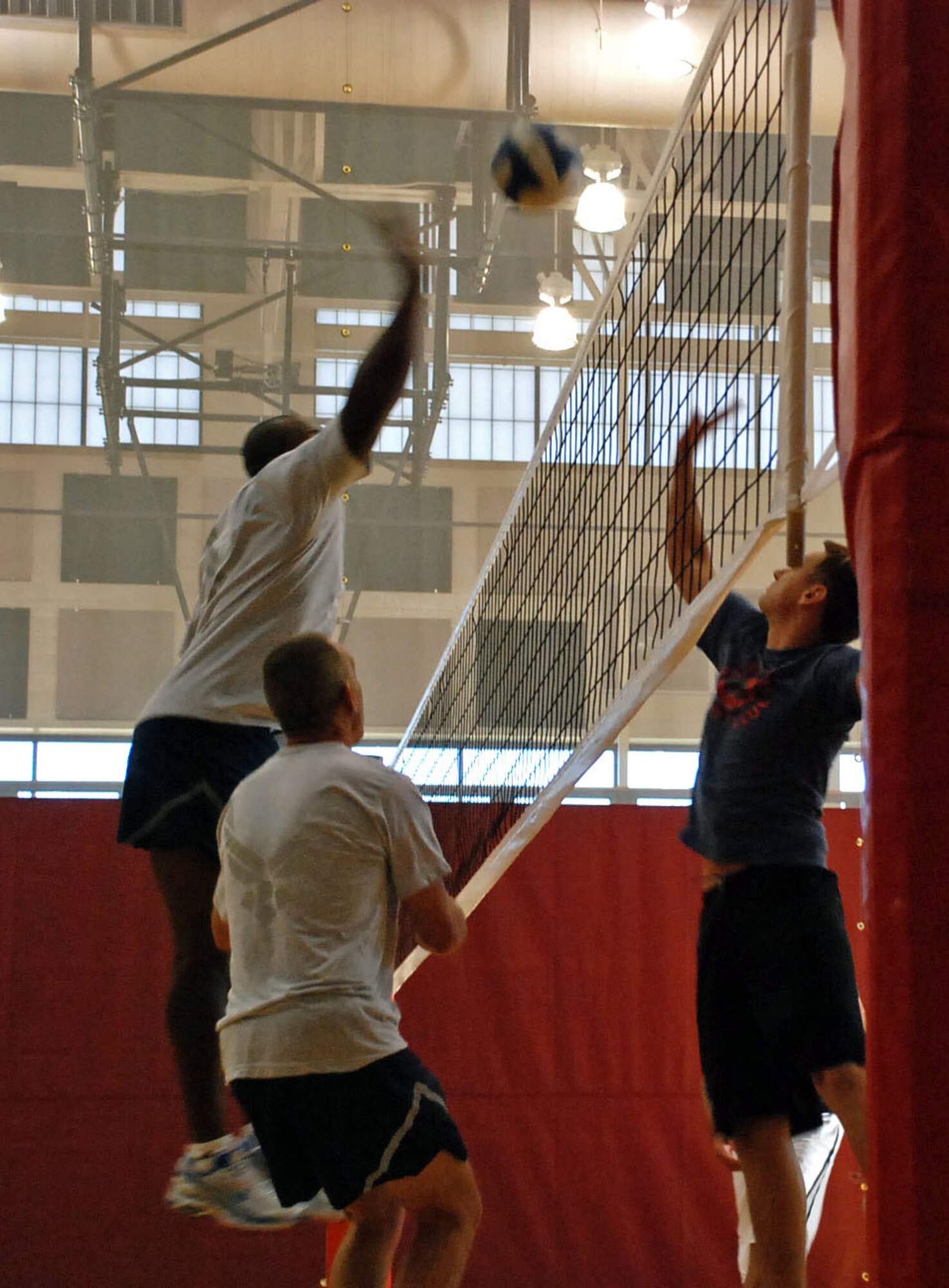 LAUGHLIN AIR FORCE BASE, Texas – The Top Three wins a best-out-of three volleyball match against Airmen from the Rising Six at the Losano Fitness Center here Dec. 12. “I think it’s a great morale booster to get these two groups together for this challenge,” said Master Sgt. Jimmy Whittington, 47th Mission Support Group first sergeant. “It was a very challenging, but the Top Three came out on top and I can’t wait to play the Rising Six again.” (U.S. Air Force photo by Airman 1st Class Sara Csurilla) 