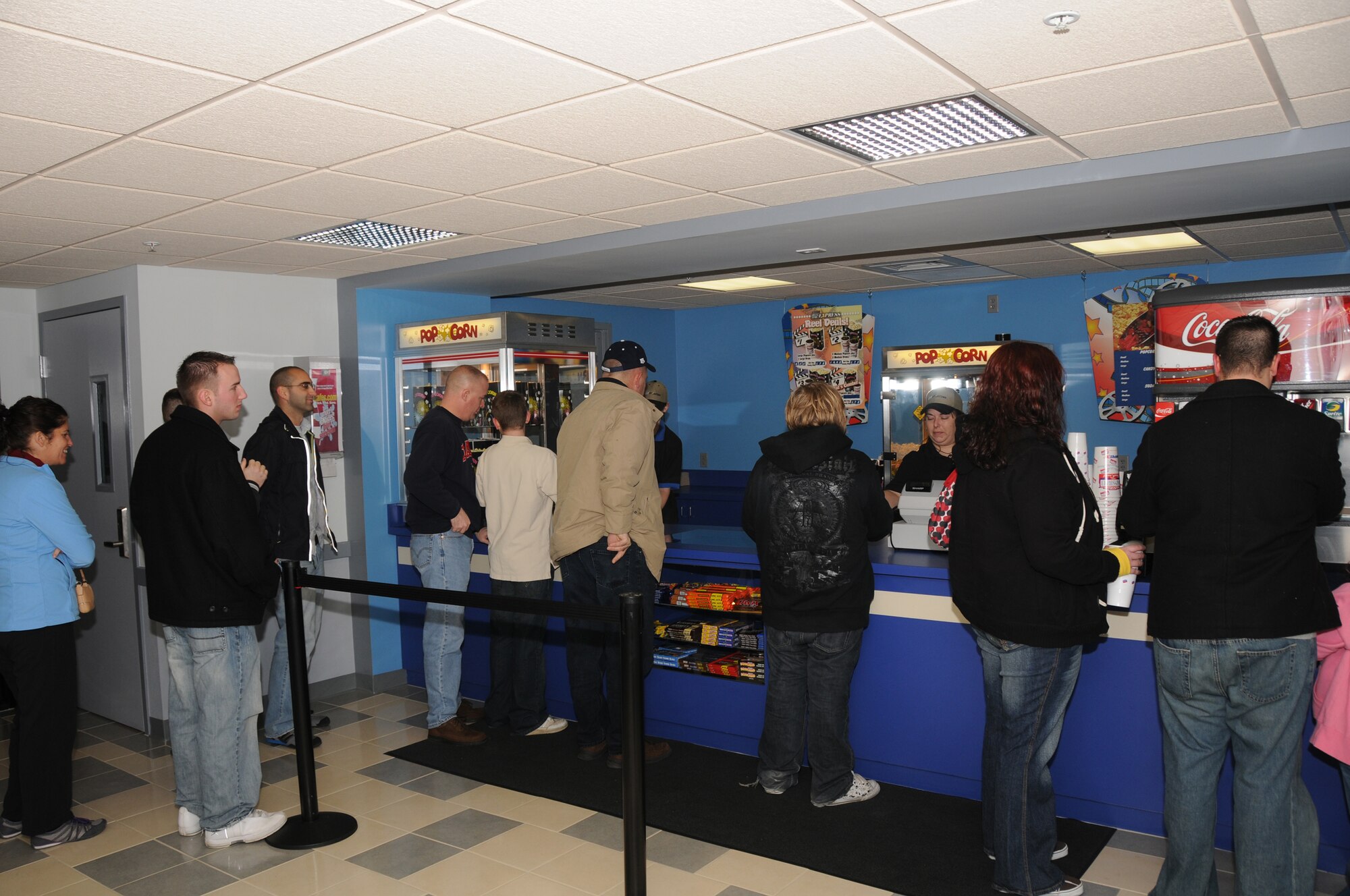 Base theater patrons use the new snack bar.  The base theater reopened Dec. 11 after four months of renovations.  (U.S. Air Force photo/Master Sgt. Joe Springfield)