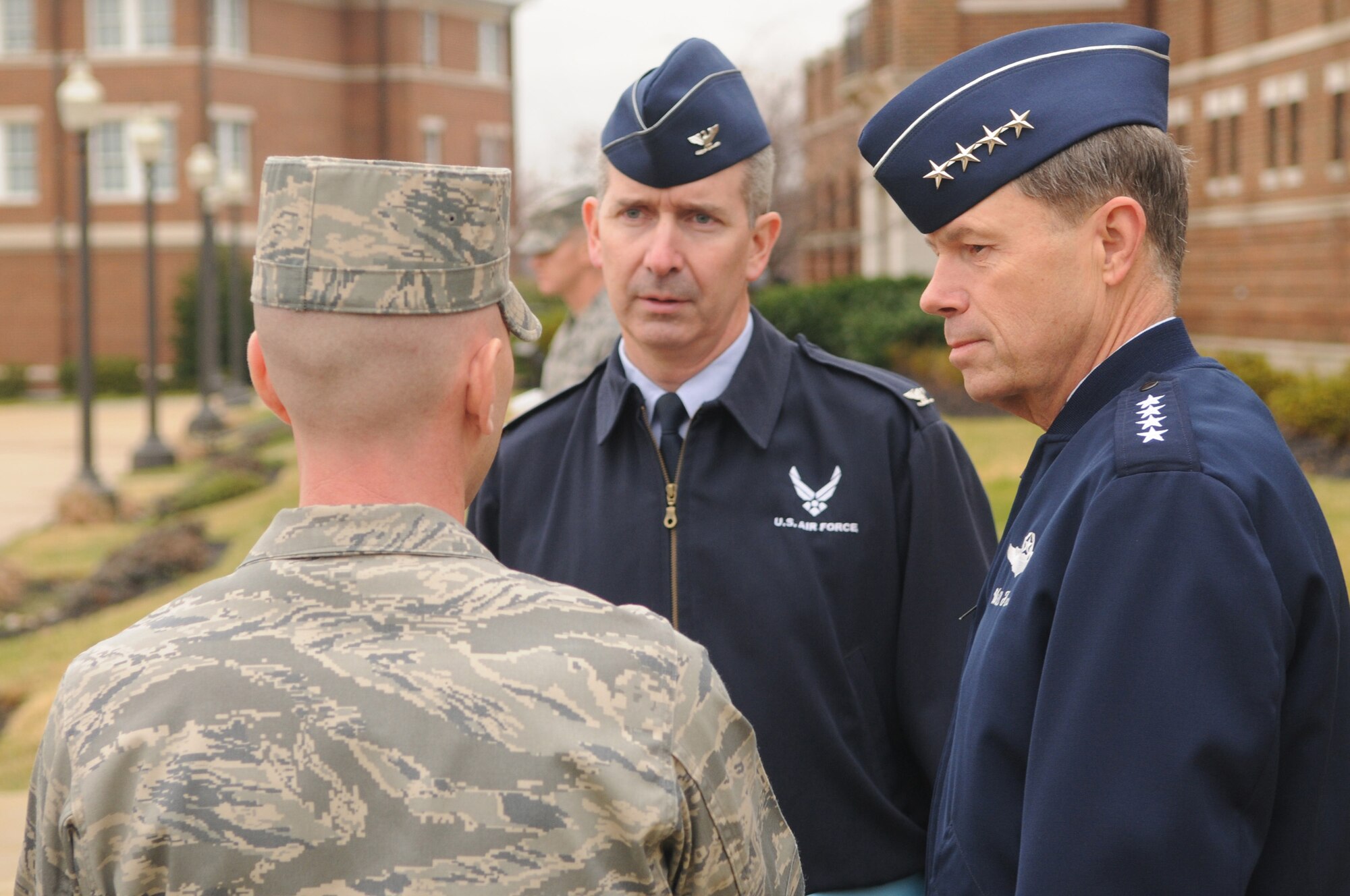 Gen. William M. Fraser III, Air Force vice chief of staff, and Col. Jon A. Roop, 11th Wing commander, speak with Lt. Col. Anthony Taylor, U.S. Air Force Honor Guard commander Dec. 17 on Bolling. General Fraser was on Bolling for an 11th Wing mission brief and tour of the base, which included the Honor Guard Ceremonial Hall and the Band hanger. (U.S. Air Force photo by Airman 1st Class Sean Adams)