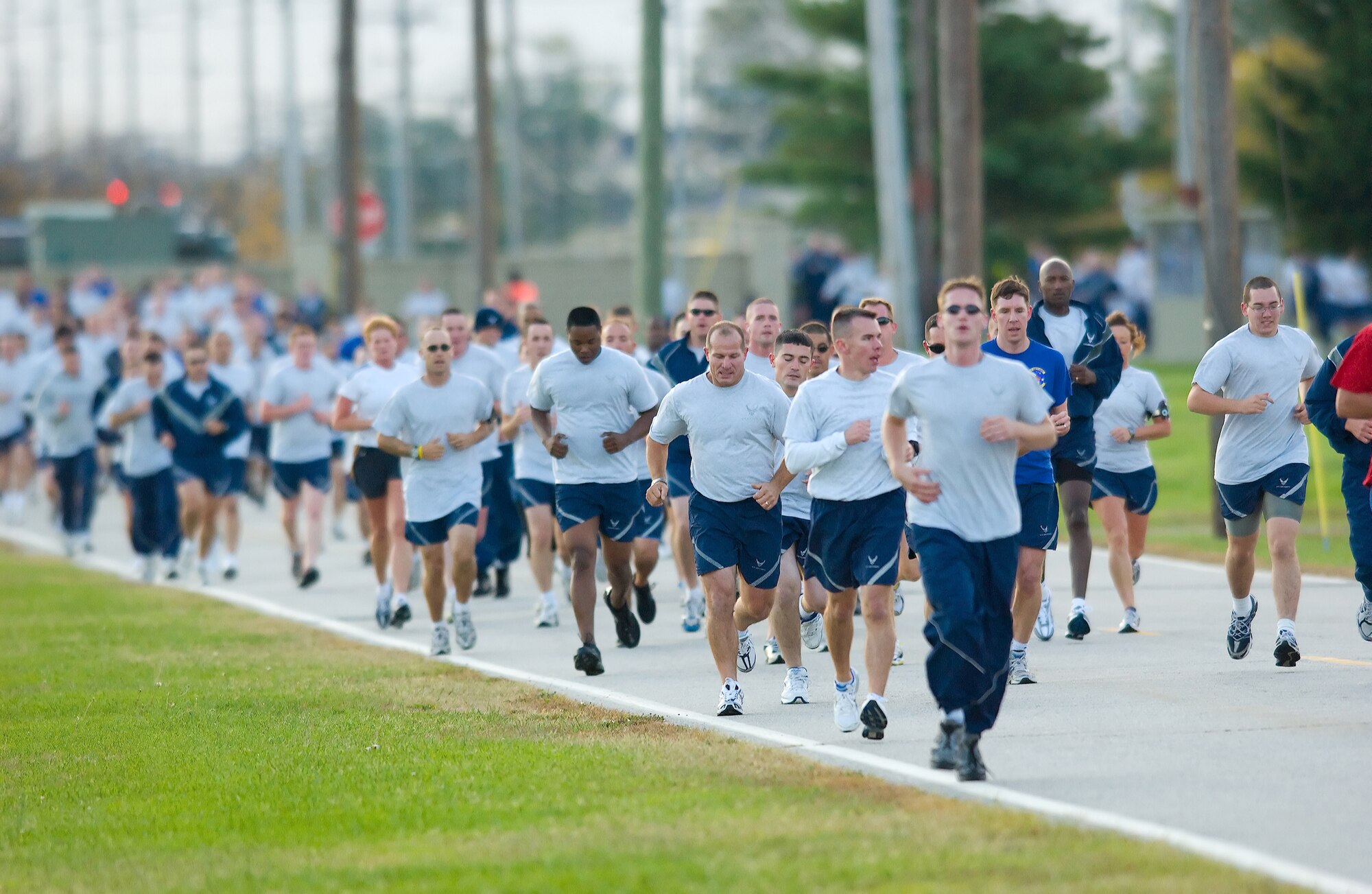 Team Dover members run on base in the Warrior Run during Wing Sports Day Oct. 17.  Nearly 700 Dover Airmen participated in the Warrior Run, the kickoff event to Wing Sports Day.  (U.S. Air Force photo/Jason Minto)