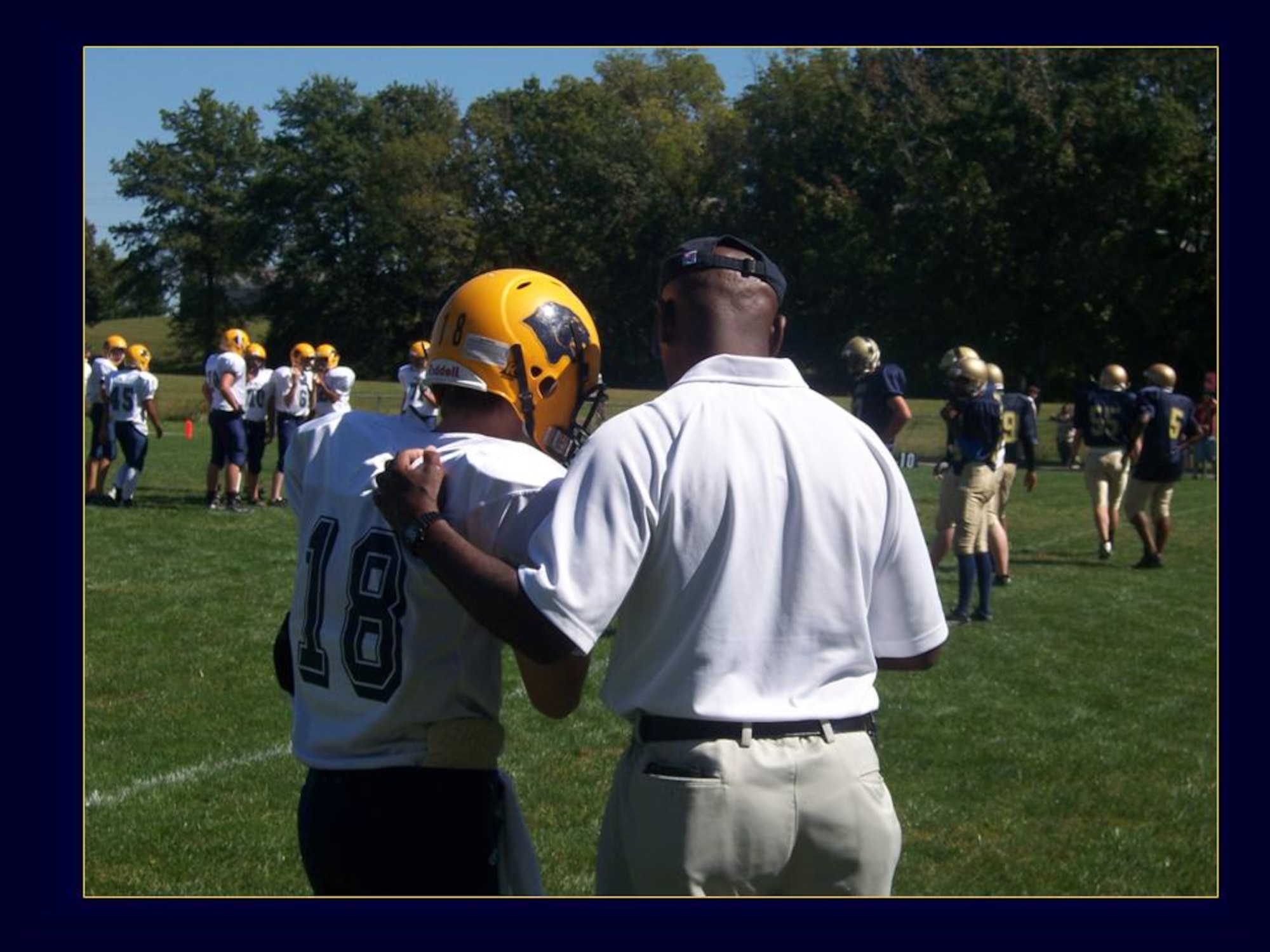 SCOOT AIR FORCE BASE, Ill. -- Mr. Mathis, who has been coaching since 2008, also volunteers as the freshman head coach and varsity quarterback coach at O’Fallon Township High School.  (U.S. Air Force photo/courtesy photo)