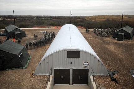 The five-day deployment exercise called the Basic Expeditionary Airman Skills and Training, or BEAST kicked off Dec. 15 at Lackland Air Force Base, Texas. The BEAST is the newly built complex added into the extended, 8.5-week Basic Military Training curriculum that began Nov. 5. (U.S. Air Force photo/Staff Sgt. Desiree N. Palacios) 

