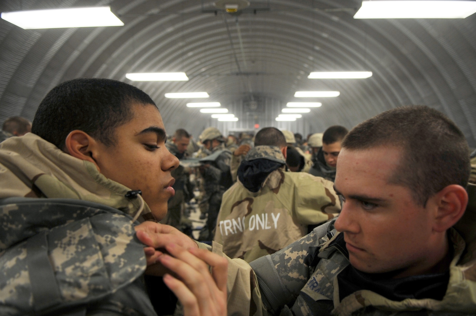 Airmen Basic trainees inspect each others body armor during the five-day deployment exercise called the Basic Expeditionary Airman Skills and Training, or BEAST, which kicked off Dec. 15 at Lackland Air Force Base, Texas. The BEAST is the newly built complex added into the extended, 8.5-week Basic Military Training curriculum that began Nov. 5. (U.S. Air Force photo/Staff Sgt. Desiree N. Palacios) 