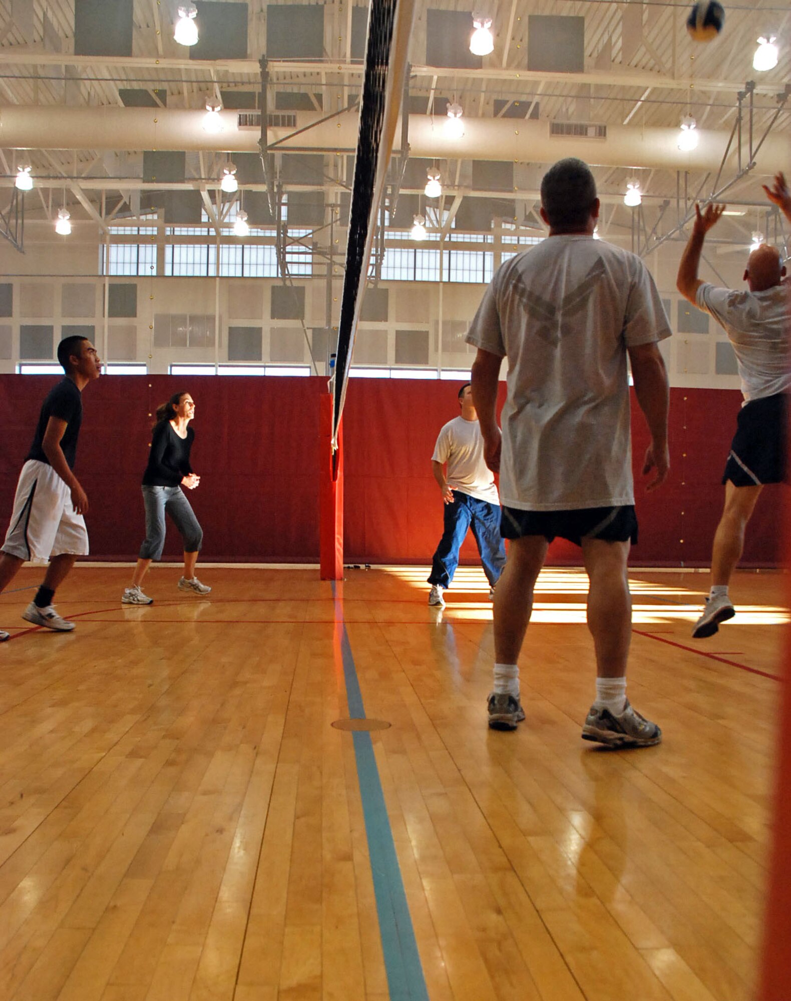 LAUGHLIN AIR FORCE BASE, Texas – The Top Three wins a best-out-of three volleyball match against Airmen from the Rising Six at the Losano Fitness Center here Dec. 12. “I think it’s a great morale booster to get these two groups together for this challenge,” said Master Sgt. Jimmy Whittington, 47th Mission Support Group first sergeant. “It was a very challenging, but the Top Three came out on top and I can’t wait to play the Rising Six again.” (U.S. Air Force photo by Airman 1st Class Sara Csurilla) 