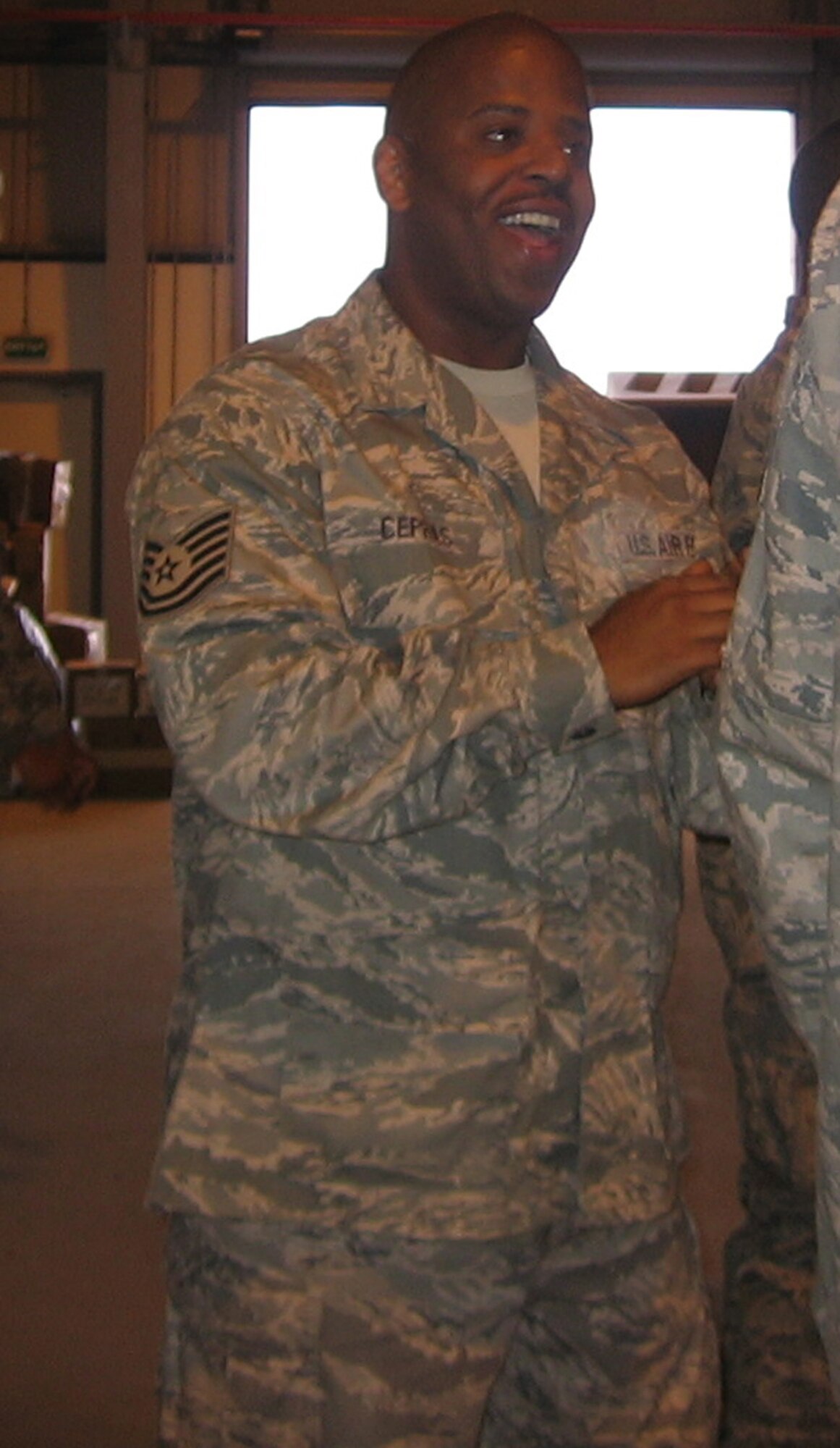 SOUTHWEST ASIA - Tech. Sgt. Michael Cephas is currently deployed from Langley. He said the first thing he will do when he gets home is hug his wife and kids. (Courtesy photo)