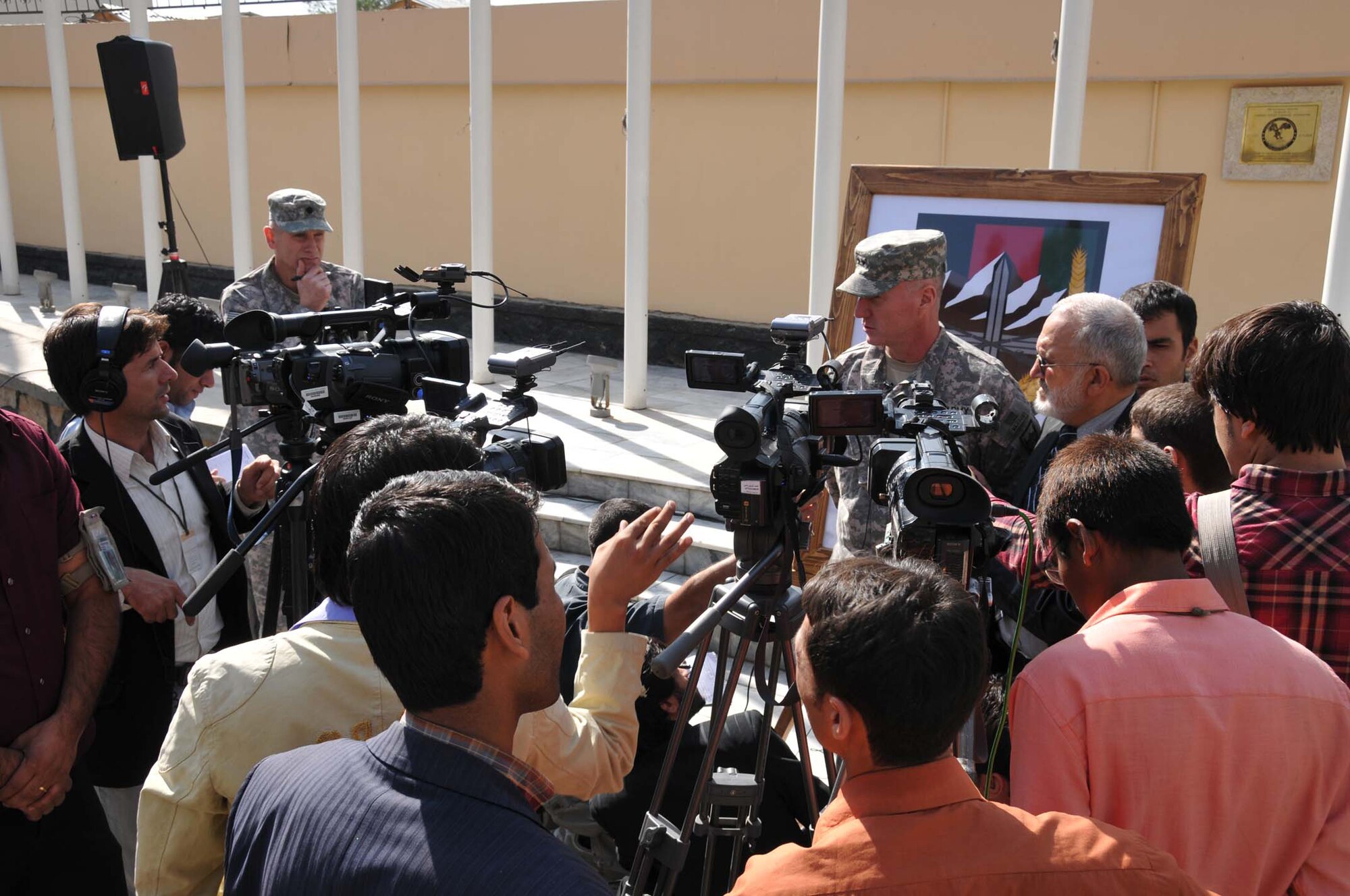 Maj Gen. Robert W. Cone, Combined Security Transition Command-Afghanistan commanding general, speaks to the press following a shoulder sleeve insignia ceremony at Camp Eggers in Kabul, Afghanistan. (Photo by Mass Communication Specialist Seaman Tim Newborn, USN) (Released)