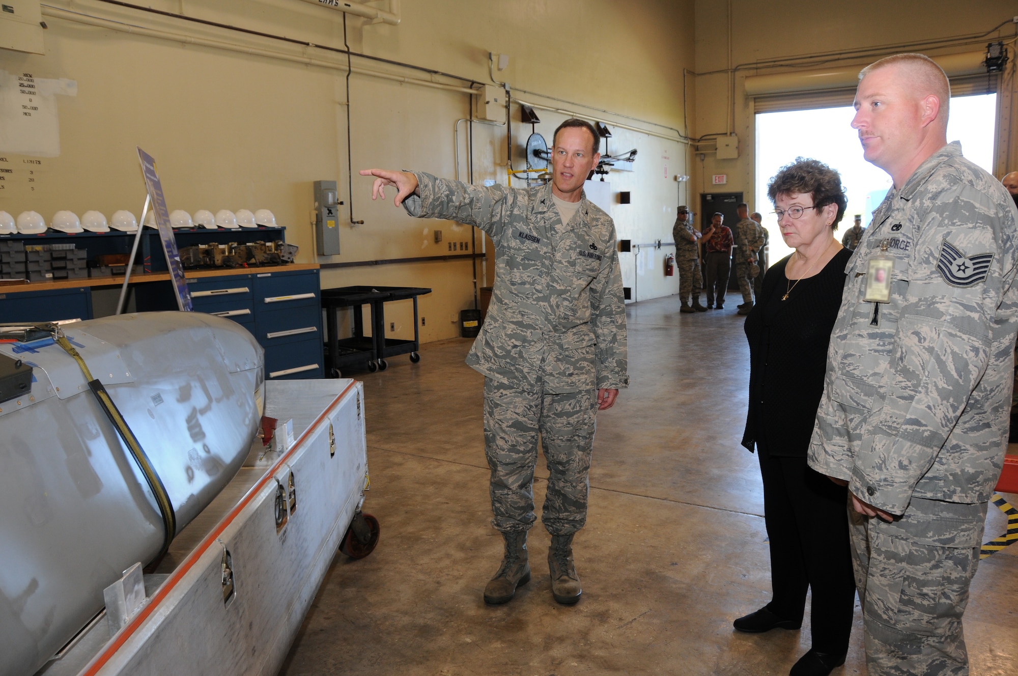 ANDERSEN AIR FORCE BASE, Guam - Col. Brett Klassen, 36th Maintenance Group commander explains the capabilities of the Conventional Air Launch Cruise Missile to Mrs. Natalie Crawford, Senior Fellow of the Research and Development Corporation and Senior Mentor for the U.S. Air Force Scientific Advisory Board during her visit here Dec.17.  Andersen has had a continuous bomber presence with bombers capable of delivering precision missiles such as the CALCM since 2004. (U.S. Air Force photo by Senior Airman Nichelle Griffiths)