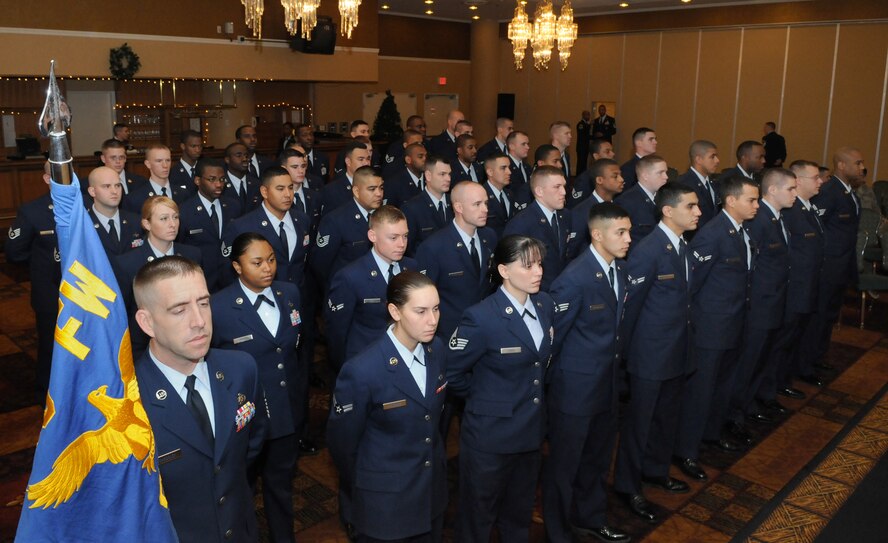 MISAWA AIR BASE, Japan -- A flight of 35th Security Forces Squadron defenders stand at parade rest during an assumption of command ceremony Dec. 15, 2008. Maj. Dustin G. Sutton, who came from Scott Air Force Base, Ill., took the reins as the new 35 SFS commander. (U.S. Air Force photo by Senior Airman Jamal D. Sutter)