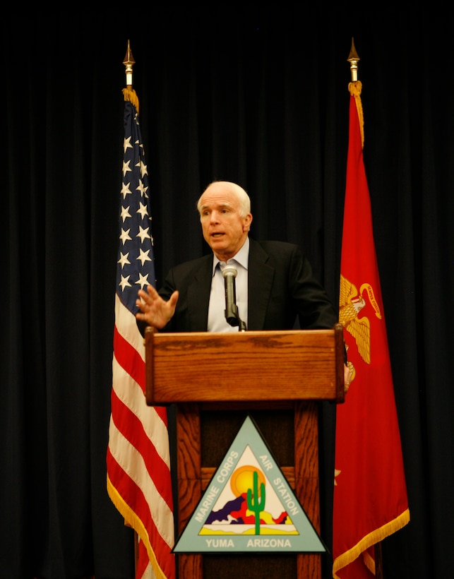 Arizona Sen. John McCain speaks to members of the media at a press conference Dec. 17, 2009, during his visit to the Marine Corps Air Station in Yuma, Ariz., to speak to Marine officials on border-related issues affecting military training in the area. McCain expressed the need to increase border facilities to move people, goods and services more rapidly across the United States-Mexico border, because Arizona is dependant on the cross-border trade. He also addressed his concern for the high level of violence in Mexico near the border.  (Photo by Cpl. Laura A. Mapes)