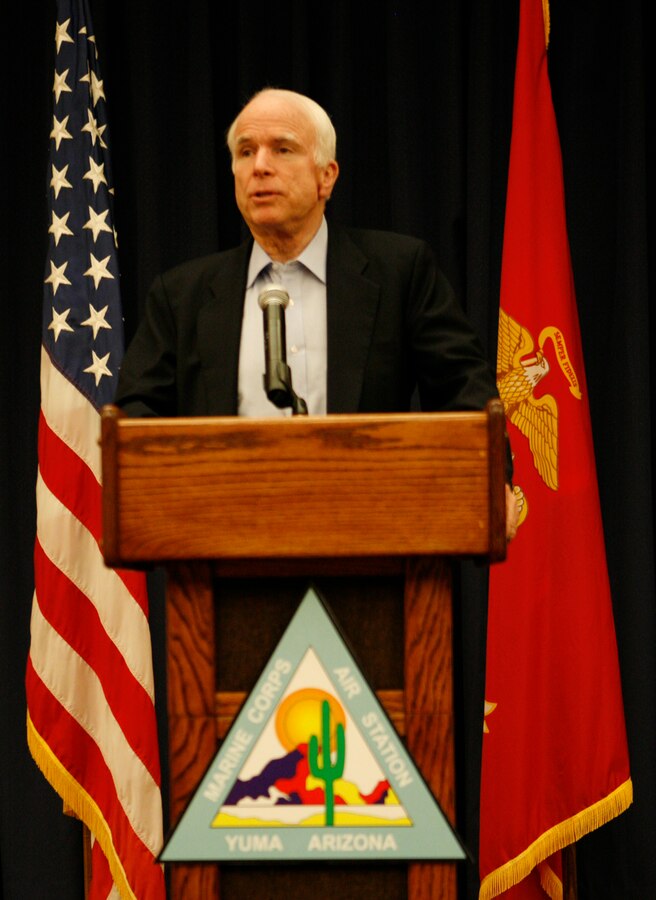 Arizona Sen. John McCain speaks to members of the media at a press conference Dec. 17, 2009, during his visit to the Marine Corps Air Station in Yuma, Ariz., to speak to Marine officials on border-related issues affecting military training in the area. McCain expressed the need to increase border facilities to move people, goods and services more rapidly across the United States-Mexico border, because Arizona is dependant on the cross-border trade. He also addressed his concern for the high level of violence in Mexico near the border.  (Photo by Cpl. Laura A. Mapes)