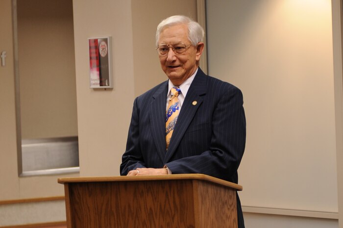 Stuart Hess, American Red Cross hospital chairman of volunteers, speaks at the President's Volunteer Service Award ceremony held in his honor at the Mike O' Callaghan Federal Hospital, Nellis Air Force Base, Nev., Dec. 15, 2008. Mr. Hess received the gold-level award for providing more than 500 volunteer hours over five years at the base hospital. (U.S. Air Force Photo / Airman 1st Class Stephanie Rubi, RELEASED)