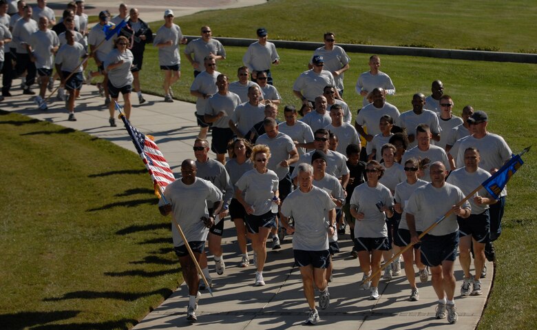 VANDENBERG AIR FORCE, Calif. -- 14th Air Force sprint to the closing ceremony during the final mile of the Run to Remember on Nov. 11 on Vandenberg Air Force Base. The run honored fallen servicemembers in the Global War on Terror. (U.S. Air Force photo/ Airman 1st Class Antionette Lyons)