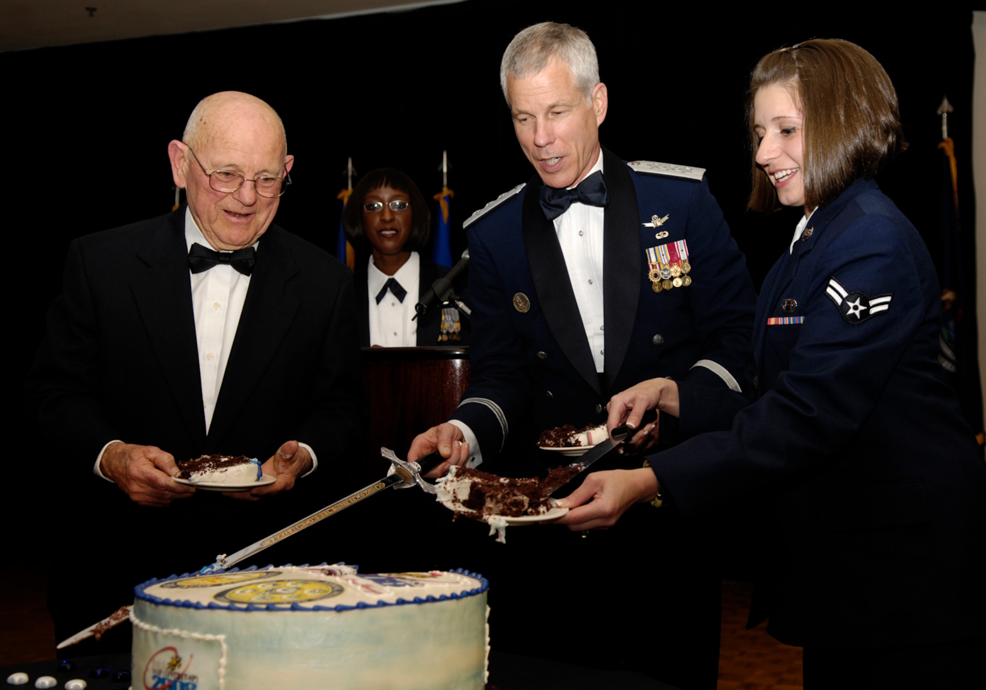 VANDENBERG AIR FORCE, Calif. -- Vandenberg celebrated its 50th anniversary on Oct. 22 by having a military ball at the Pacific Coast Club. A cake was cut by the highest and lowest ranking personnel stationed at Vandenberg to represent the journey that Vandenberg has taken in the past 50 years. (U.S. Air Force photo/ Airman 1st Class Jonathan Olds)