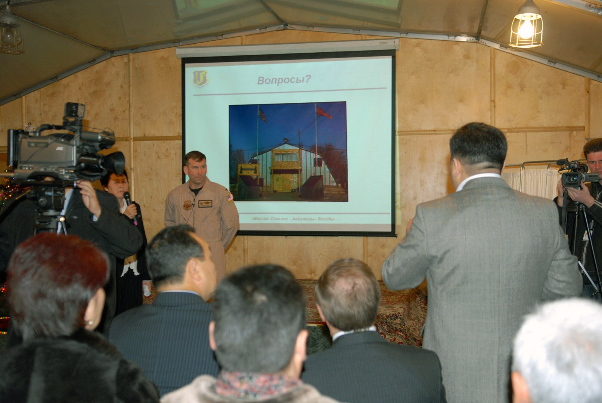 Col. Christopher Bence answers questions during a mission briefing to members of the Kyrgyz parliament during a Dec. 15 visit to Manas Air Base, Kyrgyzstan. Colonel Bence is the 376th Air Expeditionary Wing commander. (U.S. Air Force photo/Senior Airman Ruth Holcomb) 
