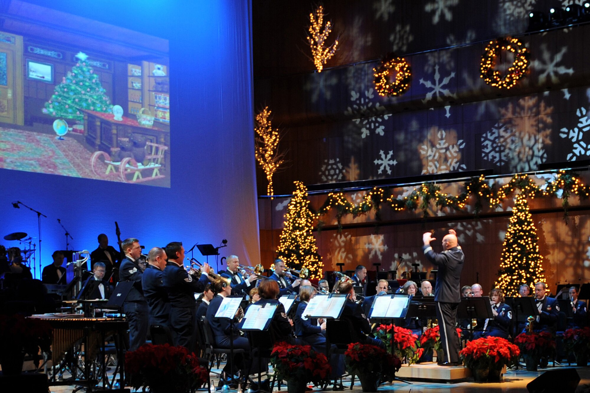 Members of the Heartland of America Band perform during "The Promise of the Season" holiday concert at the Holland Performing Arts Center Dec. 11. A special concert was performed for children from area schools. (U.S. Air Force Photo By Jeff Gates)