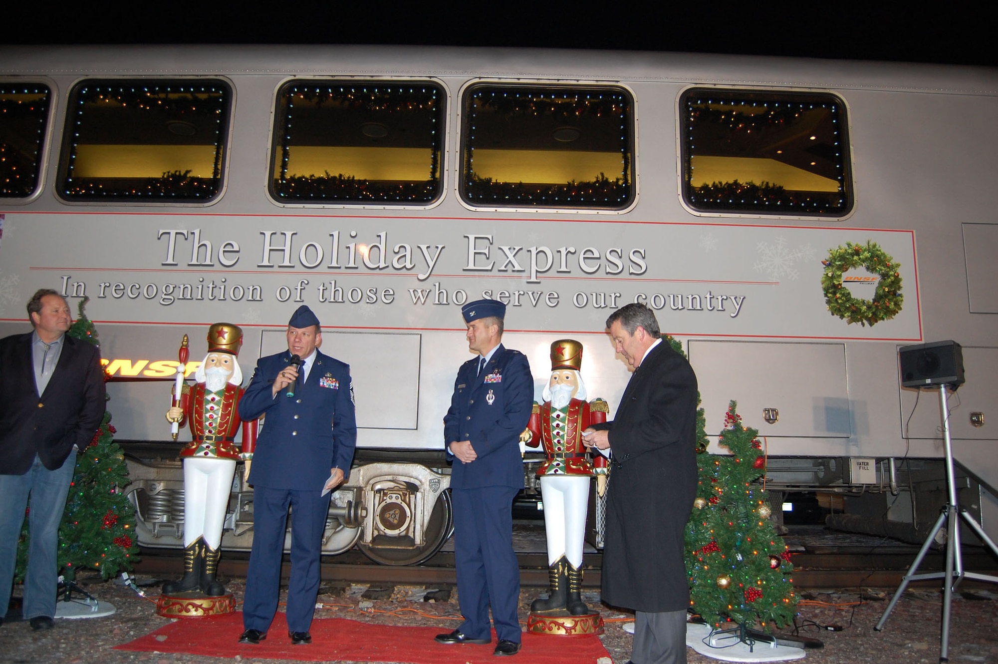 Chief Master Sgt. Steve Sargent and Col. Paul Gydesen say thanks to Matthew Rose, Chief Executive Officer for BNSF, after receiving a check in the amount of $5,000 that will support Malmstrom Airmen and their families. (U.S .Air Force Photo/1st Lt. Korry Leverett)