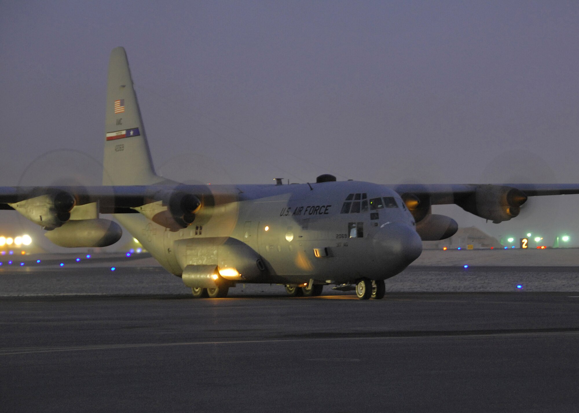 A C-130 Hercules prepares for a nighttime departure sortie mission enroute to Iraq. C-130s are prime transporters of cargo, passengers and troop resupply and support heavy airlift missions throughout Southwest Asia. This C-130 is deployed from Dyess Air Force Base, Texas and is assigned to the 386th Air Expeditionary Wing at an undisclosed base in Southwest Asia. (U.S. Air Force photo/Tech. Sgt. Raheem Moore)