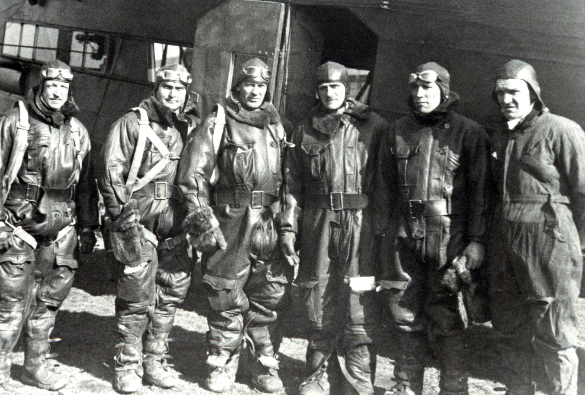 Pictured is the crew of the "Question Mark," including, from left to right, Lieutenant Halvorsen, Capt. Ira Eaker, Staff Sgt. Roy Hooe, Maj. Carl Spaatz (mission commander), Lt. Elwood "Pete" Quesada, and an unidentified crewmember.  During a 1929 operation dubbed "Question Mark," a 10,000-pound Fokker C-2A was refueled in flight by two modified Douglas C-1 transport aircraft.  A large question mark was painted on each side of the receiver aircraft's fuselage, intended to "provoke wonder at how long the aircraft could remain airborne," according to Air Force history experts.  During the operation, which began on New Year's Day in 1929 and ended 150 hours and 40 minutes later on Jan. 7, the Douglas refueling aircraft passed 5,660 gallons of fuel.  All tolled, the tankers completed 43 sorties, 12 of which occurred at night.