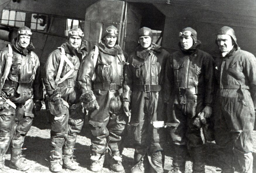 Pictured is the crew of the "Question Mark," including, from left to right, Lieutenant Halvorsen, Capt. Ira Eaker, Staff Sgt. Roy Hooe, Maj. Carl Spaatz (mission commander), Lt. Elwood "Pete" Quesada, and an unidentified crewmember. During a 1929 operation dubbed "Question Mark," a 10,000-pound Fokker C-2A was refueled in flight by two modified Douglas C-1 transport aircraft.