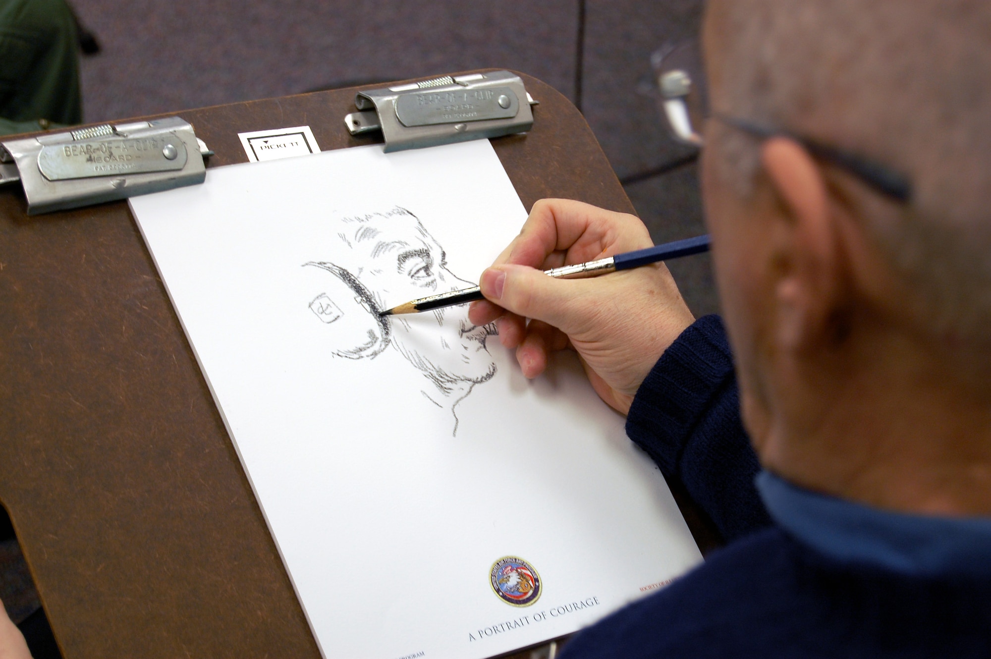 Artist John Witt, chairman of the New York Society Illustrators, makes a sketch Dec. 12, 2008, in the U.S. Air Force Expeditionary Center studio on Fort Dix, N.J.  The effort was part of preparatory work by Mr. Witt to complete a painting highlighting Expeditionary Center Airmen for the Air Force Art Program.  (U.S. Air Force Photo/Tech. Sgt. Scott T. Sturkol)
