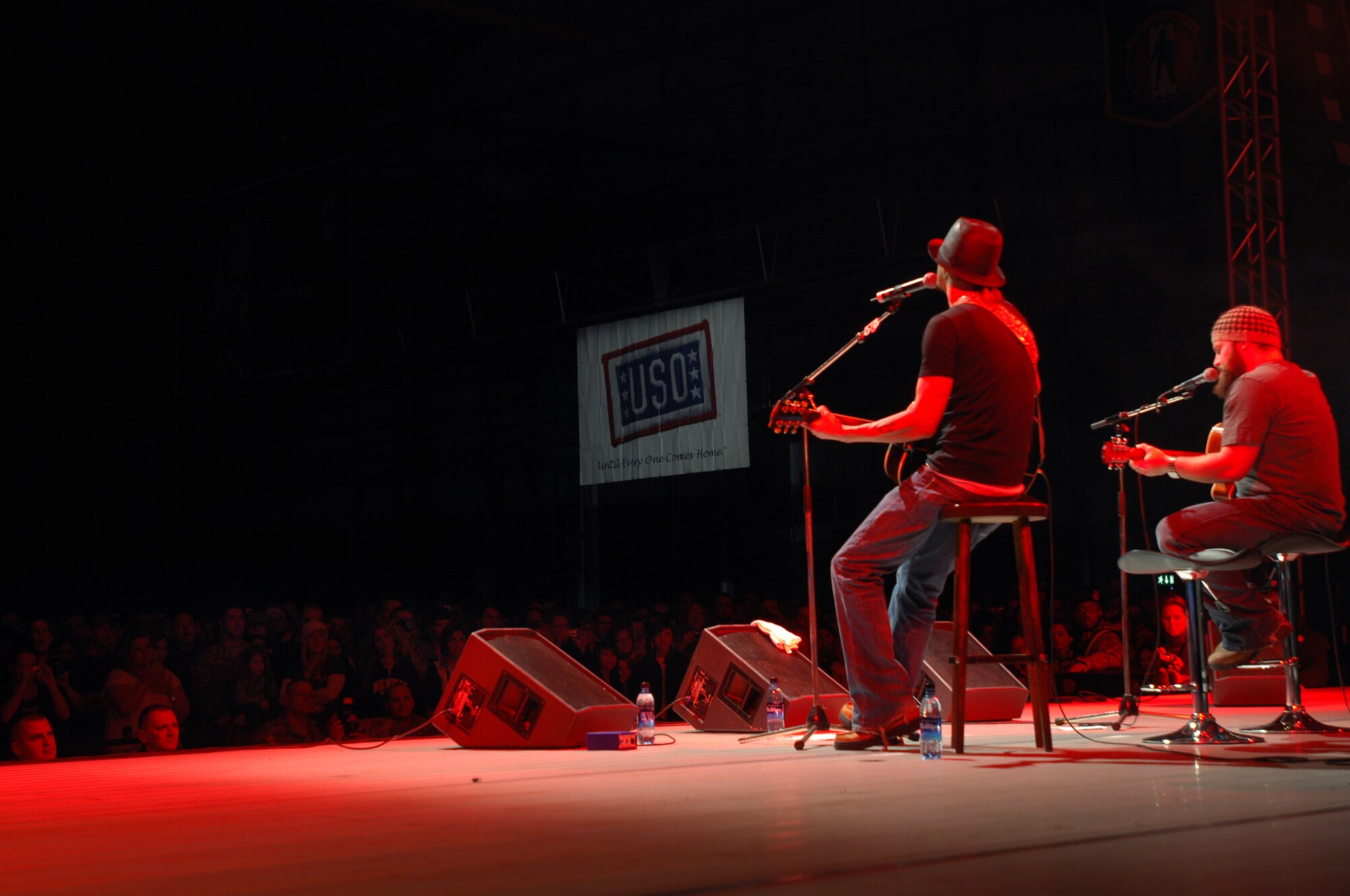 Kid Rock performs during the United Service Organizations (USO) Holiday Tour stop in Hanger 1 at Ramstein Air Base, Germany, Dec. 16, 2008. Other USO entertainers included Lewis Black and Kellie Pickler. (U.S. Air Force photo by Airman 1st Class Kenneth Holston)