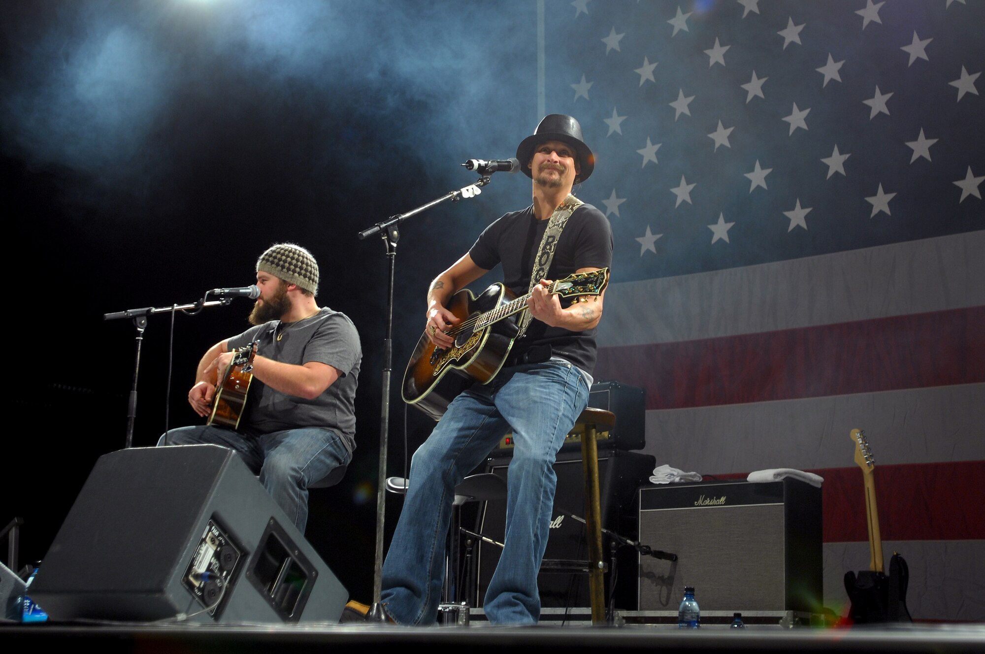 Kid Rock performs during the United Service Organizations (USO) Holiday Tour stop in Hanger 1 at Ramstein Air Base, Germany, Dec. 16, 2008. Other USO entertainers included Lewis Black and Kellie Pickler. (U.S. Air Force photo by Airman 1st Class Kenneth Holston)