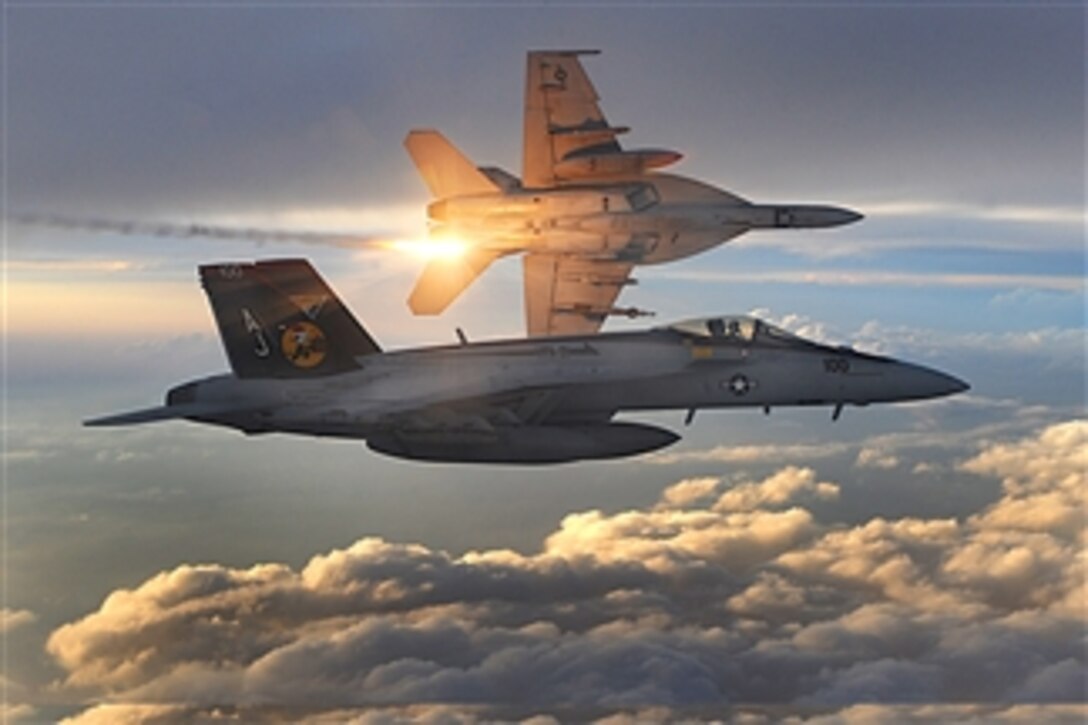 Two U.S. Navy F/A-18 Super Hornets from Strike Fighter Squadron 31 fly a combat patrol over Afghanistan on Dec. 15, 2008.  
