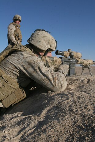 Snipers with Scout Sniper Platoon, Task Force 1st Battalion, 2nd Marine Regiment, Regimental Combat Team 5, conduct a training range in order to readjust their weapons to the battalion's new area of operations in support of the Fighting Fifth Marines. The battalion recently completed the movement from RCT-1's area of operations and plans to continue its mission to facilitate a sustainable Iraqi infrastructure in Rawah, Iraq.