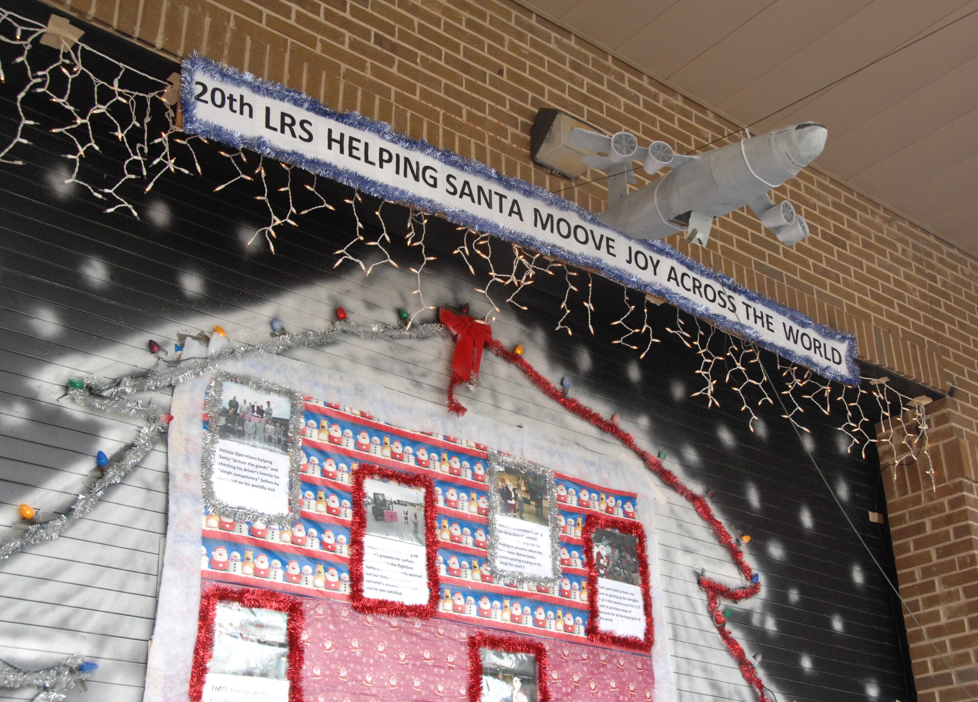 SHAW AIR FORCE BASE, S.C. -- This garage door at the Deployment Processing Center was decorated to compete in the door decorating contest and and to show how the 20th Logistics Readiness Squadron helps Santa moove joy across the world. (U.S. Air Force photo/2nd Lt. Emily Chilson)