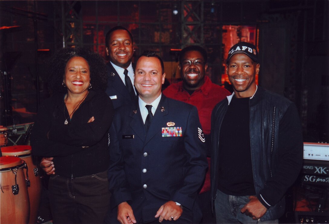 11/18/08 -- After Leno taping SSgt Ellison and TSgt Rosenak take time for a photo op with members of the Tonight Show Band. (Photo by NBC Staff) 