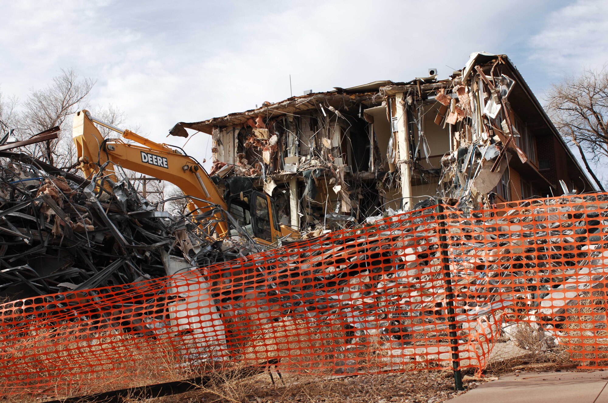 CANNON AIR FORCE BASE, N.M. - The remains of an unused dormitory wait to be demolished Dec. 19 as part of ongoing construction around base. As the base continues to grow, new dormitories are scheduled to be constructed. (U.S. Air Force photo/Airman 1st Class Elliott Sprehe)