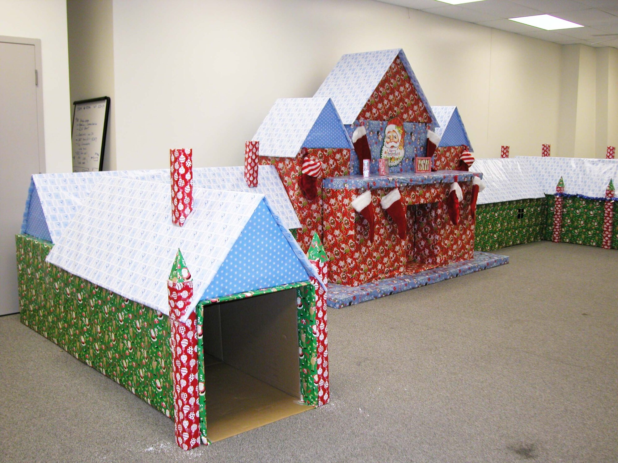 This photo shows one of the access points where children can crawl through Santa's Village at March Air Reserve Base, Calif.  The village was designed by Senior Master Sgt. Mike Kastner, 452nd Civil Engineer Squadron, to help put the children of base personnel into the Christmas spirit.  (U.S. Air Force photo by Will Alexander)