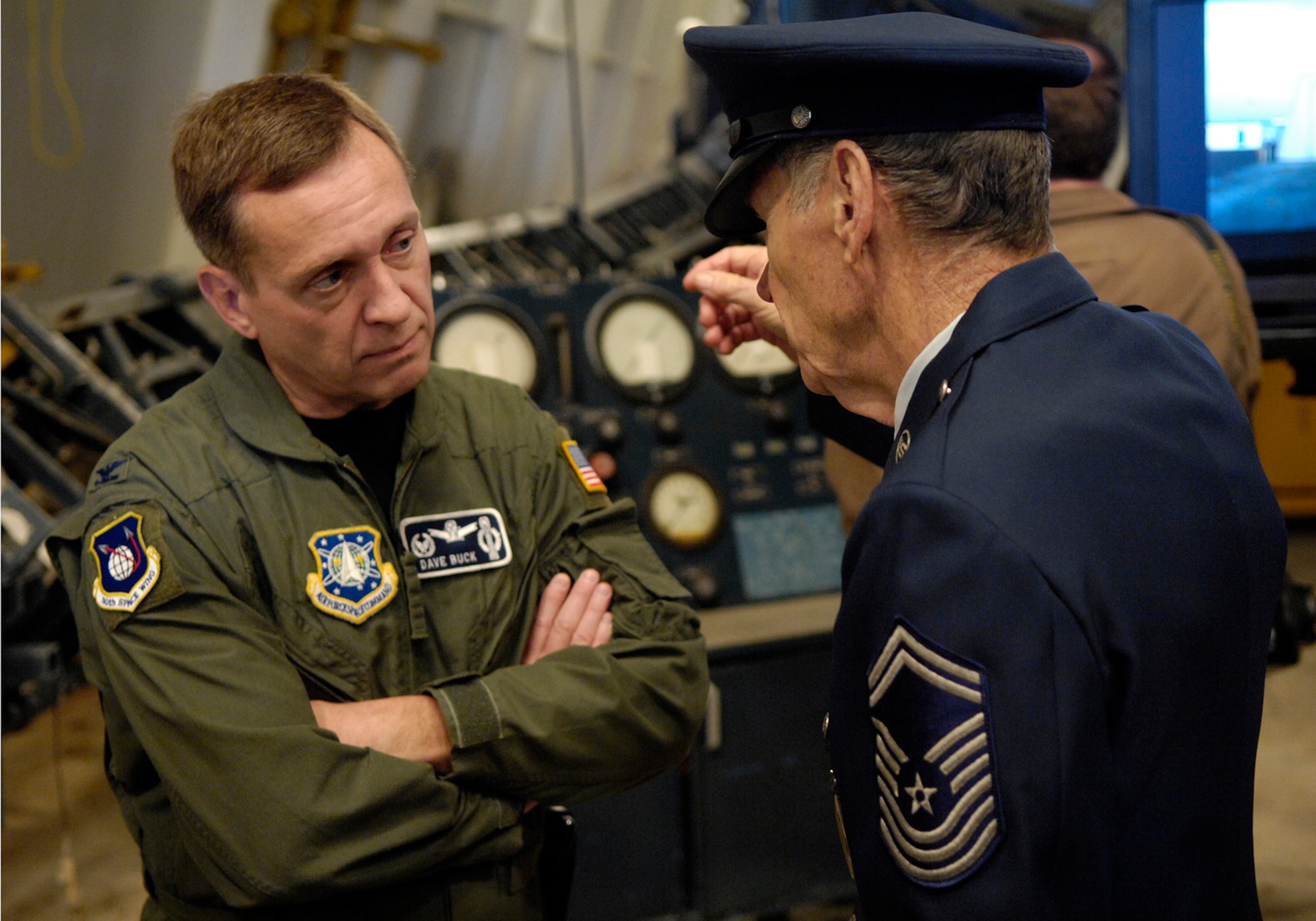 VANDENBERG AIR FORCE BASE, Calif. -- Col. David Buck, 30th Space Wing commander, speaks with Chief Master Sgt. (Ret.) Roy Stovall during the Thor Reunion Tour at the Space Launch Complex 2 on Tuesday. (U.S. Air Force photo/ Airman 1st Class Jonathan Olds) 