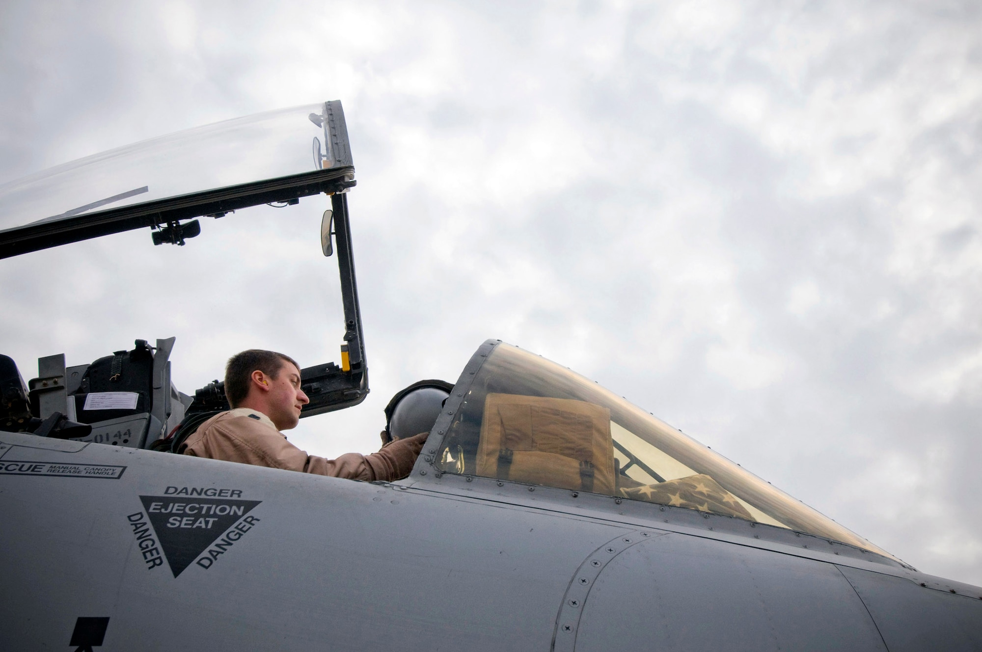 Capt. Eric Fleming prepares for takeoff in an A-10 Thunderbolt II Dec. 2 at Bagram Airfield, Afghanistan. Captain Fleming is the assistant wing weapons and tactics officer and an A-10 pilot. The large bubble-style canopy of the A-10 gives the pilot optimal visibility of the ground and surroundings during missions. He is deployed from Moody Air Force Base, Ga., and hails from Philadelphia. (U.S. Air Force photo/Staff Sgt. Samuel Morse) 
