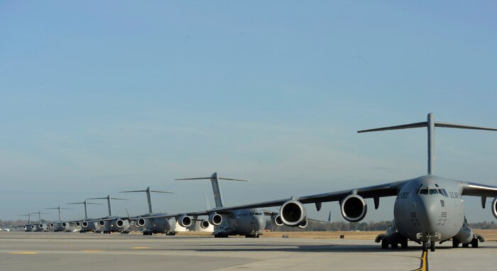 Thirteen C-17 Globemaster IIIs from the 437th Airlift Wing prepare to take off on a large-formation exercise Dec. 18 at Charleston Air Force Base, S.C. The aim of the exercise is to maintain the ability of the Air Force to drop the equivalent of an Army brigade within 30 minutes. (U.S. Air Force photo/Staff Sgt. James L. Harper Jr.)